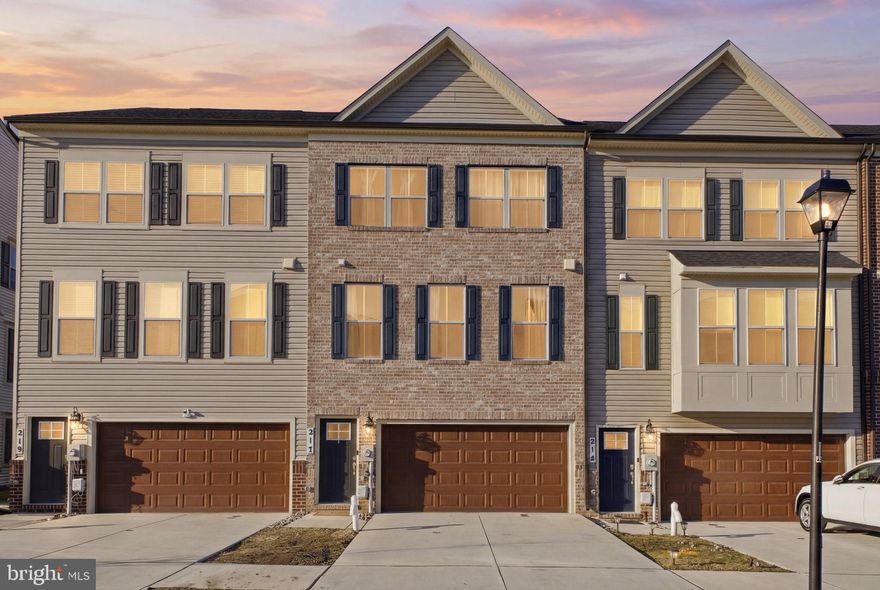 Welcome to your new home in the heart of Accokeek — a beautifully designed 3-level townhome offering 3 bedrooms, 2 full baths, and 2 half baths, nestled within one of the area’s most desirable and amenity-rich communities. Join us for an open house on Sunday 3/8 from 2-4 pm. Built as a new construction in 2023, the home is thoughtfully crafted with modern finishes, an open-concept layout, a two-car garage residence, and tons of natural lighting. Step inside to discover a bright and airy floorplan anchored by a central kitchen featuring stainless steel gas appliances, a farmhouse sink, and a spacious center island perfect for casual dining or entertaining guests. The kitchen flows seamlessly into the great room, which provides direct access to a double deck — creating the ideal setting for hosting gatherings or peaceful outdoor moments.

The home offers multiple living areas designed for comfort and versatility. The lower level includes a recreation room and powder room, providing additional flexible space for a home office, media room, or play area. Upstairs, retreat to the luxurious Owner’s Suite complete with a walk-in closet and private en-suite bath. Two additional generously sized bedrooms and a full bathroom complete the upper level, offering ample space for family or guests.

The Signature Club community offers exceptional amenities including a clubhouse for neighborhood gatherings, a multi-sports court with basketball and pickleball, multiple playgrounds, and expansive open green spaces. This home’s prime location offers convenient access to Capitol Hill, DC, northern Virginia, and southern Maryland. Don’t expect this home to be on the market for long — schedule your showing today!