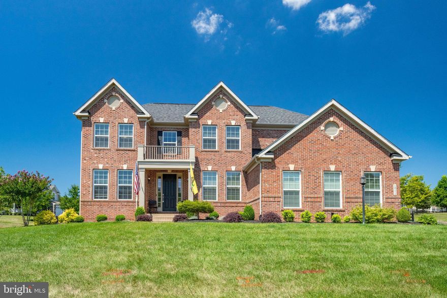 Welcome to Hunter Ridge Estates! Pull into the widened driveway and you’ll instantly fall in love with this impeccable 5 bedroom, 3.5 bathroom brick home. Walk through the manicured lawn with professional landscaping to the front door and you’ll feel like you’re finally home! Enter into the grand foyer, and you’ll marvel at the open staircase with a pass-through to the kitchen. To your right is the perfect home office with glass french doors, and to your left is the light-filled formal living room. Adjacent to the living room is your formal dining room, great for all of your dinner parties or special occasions. Continue through to the back of the house, where you’ll find a spacious and modern gourmet kitchen complete with stainless steel appliances (2013), under cabinet lighting, bar seating for six, and a brand new ultra-quiet garbage disposal. The kitchen opens into a serene morning room, where you can enjoy a casual breakfast or family dinner. Finishing off the main floor is the comfortably-sized family room with a gorgeous stone fireplace and it’s already fully wired with Dolby Atmos surround sound for movie night. The hallway brings you to the main floor powder room and back to the foyer for easy access throughout the entire main floor. Up the stairs with motion-activated stair lights, where you’ll discover the top floor laundry room with Premium LG Washing Machine & Dryer (2016). Through the french doors is your retreat - the Primary bedroom with plush carpeting, ceiling fan, expansive walk-in closet with movement-sensing lights, and a private sitting area. Relish in the privacy of your en suite bathroom with soaking tub and built-in shower seat. Down the hall are three additional bedrooms and a handsome full bathroom with double sink vanity for your children or overnight guests. The lower level of this home is too sophisticated to be called a basement and was completely renovated in 2019. With a stunning stone wall and built-in bar, the roomy rec room is a true adult getaway. A fifth bedroom is located on this level, great for a guest bedroom or home gym. An additional room with a stylish reclaimed barn wood accent wall is also on the lower level, perhaps a second home office or library. One more full bathroom and a sizable storage room round out the interior of the home. Even more storage can be found in the attic and above the garage. Outside, the beauty doesn’t stop! Step onto your refinished deck with Moisture Shield composite decking and imagine sitting there on a summer evening, while the kids play in the flat fenced backyard with its 13-zone sprinkler system. The custom french drain system and professional maintenance keeps the grass in perfect condition. The three car garage is outfitted with NewAge Pro-series cabinets, toolboxes, and lockers, making it so much more than just a safe place to park your cars. House is wired with 5-zones of in-wall audio, ethernet, TV, commercial-grade WiFi, an Aprilaire 800 Series whole-house steam humidifier, and two APCO Fresh-Aire UV whole-house air purifiers. Brand new water heater (2022), newer HVAC (2013), newer windows (2013) and upgraded architectural roofing shingles (2013). Minutes to Food Lion, Giant Food, Safeway, Wegmans, Target, Walmart, Prince William Forest Park and campgrounds, Prince William Ice Center, Potomac Mills, Stonebridge at Potomac Town Center, and plentiful shopping and dining choices. You have to come check out this hidden gem, because they’ve thought of everything. Say hello to luxury today!