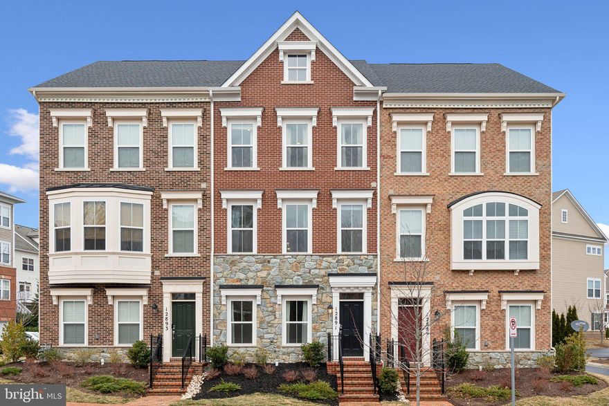 Stunning 4-Level Townhome in Clarksburg Square – Like New!
Welcome to this gorgeous Craftmark Richmond model townhome in the sought-after Clarksburg Square community! This recently built 4-level home offers modern luxury, spacious living, and thoughtful design. Step inside to hardwood flooring that flows throughout the open-concept main level. The gourmet kitchen is a chef’s dream, featuring a large island, plenty of cabinet space, and high-end finishes—perfect for entertaining. The bright and airy living and dining areas open to a deck, ideal for relaxing or hosting guests. Upstairs, the third level houses the primary suite,  along with two additional bedrooms, two full bathrooms, and a convenient third-floor laundry. The fourth level loft/bedroom provides extra living space, complete with its own full bathroom—ideal for a guest suite, home office, or bonus room. The attached garage adds convenience, while the home’s prime location in Clarksburg Square offers easy access to shopping, dining, major commuter routes, and top-rated schools. Don’t miss your chance to own this like-new, move-in-ready home—schedule your tour today!