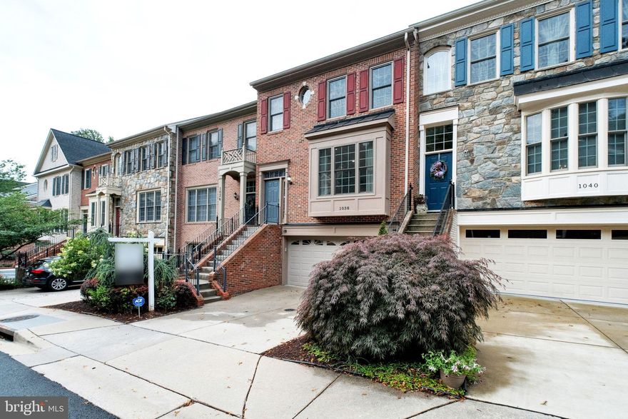 Welcome to this beautifully updated three-bedroom, two-and-a-half-bath townhome, offering the perfect blend of modern finishes and functional living in a prime location. 

Step inside to an open-concept main level featuring hardwood floors and a seamless flow between the living and dining areas—ideal for both everyday living and entertaining. The stunning, fully renovated kitchen boasts quartz  countertops, stainless steel appliances, abundant cabinetry, and a breakfast bar, perfect for casual meals or gathering with friends and family. There is even a large space for a kitchen table of sofa for additional living space. The kitchen flows seamlessly onto the large private deck - perfect for gilling in these summer months.

Upstairs, you’ll find three spacious bedrooms, including a primary suite with walk in closet and a beautifully renovated en-suite bathroom. Two additional bedrooms share a stylish full bath, and an upstairs laundry closet adds everyday convenience.

The walk-out lower level features a large family room with a cozy fireplace, creating the perfect space for movie nights or relaxing weekends. Glass doors lead out to a private, fenced patio—ideal for outdoor dining or enjoying your morning coffee in peace.

This home is a true gem - updated kitchen and bathrooms throughout, energy-efficient windows, and plenty of storage. Enjoy easy access to local shops, restaurants, parks, and commuter routes, making this home the total package for today’s renter.

Don’t miss your chance to experience stylish, turnkey living—schedule your private tour today!

*All square footage and dimensions are approximate.