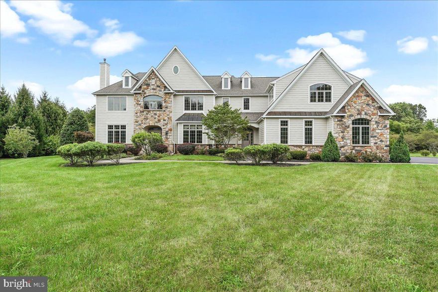 Beautiful custom built home loaded with upgrades throughout. This home was built by the builder for the builder with so much attention to detail.  Upon pulling into the driveway you will notice the brand new look and feel of this home with all new hardiplank siding.  As you enter into the expansive front to back two story foyer you will notice the details in the ceilings, floors and walls. This floor offers an additional main bedroom with a full bath perfect for in law quarters or a guest room or if you need a first floor bedroom. This home is the entertainers dream. There are 10 foot ceilings throughout. The formal dining room offers reclaimed floors from a local barn, and unique window pane ceiling molding PLUS a butlers pantry. The formal living room offers a gorgeous stone fireplace with access to the main floor bedroom.  This wing of the home could be a perfect guest or in law suite. The oversized kitchen boasts custom cherry cabinets with granite countertops an oversized island, top tier appliances and a sunny breakfast room with built in cabinets and a slider to the patio. Huge two story family room right off the kitchen is great for any gathering with the main focal point being the expansive  stone wall fireplace. Off the family room is an oversized mud room and powder room, one of the two sets of stairs to the second floor and basement as well as access to the three car garage and plenty of storage. Upstairs is well laid out with large bedrooms, wide hallways, 9 foot ceilings and bathrooms for all the bedrooms. At one end of the hall is the primary second floor bedroom entered through a set of double doors to a sitting room. Off the sitting room is a large bedroom with great closet space and a gorgeous full bath with a huge shower with multiple shower heads and a Jacuzzi tub. This floor offers four additional bedrooms all with a bathroom, one of the bedrooms offers a half bath as this was used as an exercise room. The laundry is also on this level. The lower level is finished with so much space. There is a workout area, full bath and recreational space plus a craft, study room and a theater room that is waiting to be finished. There is also plenty of storage. The basement is also a walkout basement to a gorgeous lot.  This home is situated  on a great lot at the back of a cul-de-sac in Worcester Township (Methacton Schools)with a level yard with pond views.  This home has been updated throughout including fixtures, appliances, paint, carpet, hardiplank siding and more. This lovely home is move in ready!