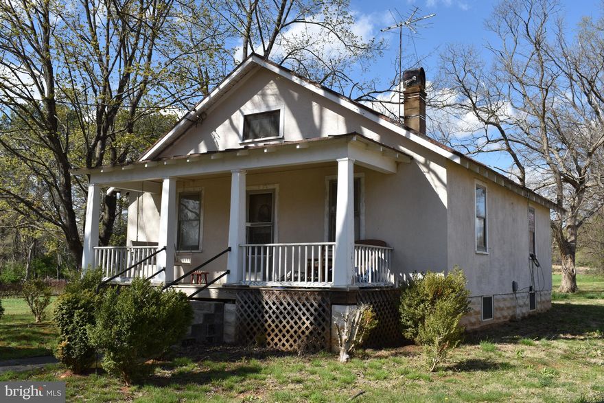 GREAT Property in fantastic location very close to Route 7 and the new interchange of 690 and 7.  Road construction around property speaks of many other uses other than residential.  Check with county for specific possibilities or possibilities to subdivide.  The 5 acres is flat without a rock in sight and looks to be very nice plant-able ground for a small farmette.  Home need substantial renovation work but is currently lived in by a long term tenant who would love to stay if the buyer intends to do any building or subdividing of the property.  Structurally, the home seems to be in very good shape.  It just needs a lot of cosmetic updates, kitchen updates, and overall renovation of spaces.  The attic is walk up and could easily be a playroom, exercise room, or third bedroom.  Currently the home is served by septic and well.