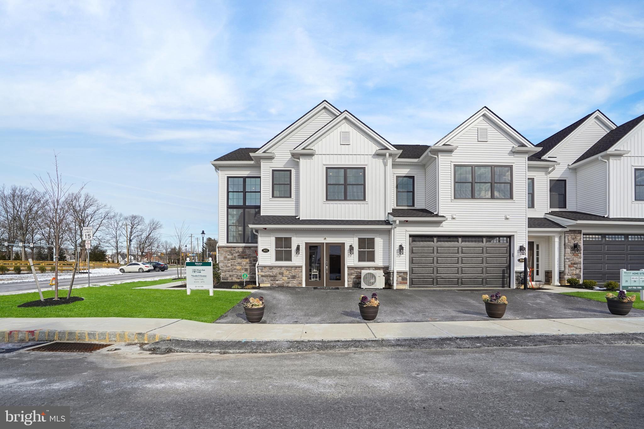 WELCOME to BARCLAY HILL - NEW 2025 PRICING! DeLuca Homes newest 55+ Community. Model Homes tours are available every day. Also quick delivery homes are available today! Brookhaven Model WITH Basement and Deck - Welcome to your new luxury residence, where elegance and modern finishes combine to create the perfect living experience. This stunning home boasts a host of premium features designed for comfort, style, and convenience. Step into the grand family room with its soaring cathedral ceiling, creating an airy, spacious ambiance perfect for both relaxing and entertaining. The primary bedroom is a tranquil retreat featuring a sophisticated tray ceiling, providing an added touch of luxury. The gourmet kitchen is a chef’s dream, equipped with high-end KitchenAid appliances, Century cabinetry, and under-cabinet lighting. The enlarged kitchen island offers ample space for meal prep and casual dining, while the beautiful ceramic tile backsplash and quartz countertops throughout the kitchen and bathrooms enhance the home’s elegant aesthetic. Your culinary endeavors are supported by a convenient gas grill line, ensuring your outdoor cooking experiences are just as delightful as those indoors. The oak stairs with painted risers lead you to the upper level, where upgraded carpet in all bedrooms ensures comfort underfoot. Recessed lighting throughout the home provides a sleek, modern look, and pre-wiring for ceiling fans in all bedrooms and the family room offers year-round comfort. Hardwood floors flow seamlessly through the main living areas, with ceramic tile in the laundry room for durability and ease of maintenance. The bathrooms are upgraded with ceramic tile, upgraded faucets, and quartz countertops. The primary bathroom features a frameless shower door for a spa-like experience. Additional features include a garage door opener with a keypad for easy access, and ceramic tile in the laundry room, making everyday chores a breeze. This exquisite home combines style, functionality, and luxury in every detail. Don't miss the opportunity to make it yours and experience the pinnacle of modern living. Schedule a viewing today and discover all the exceptional features this property has to offer.