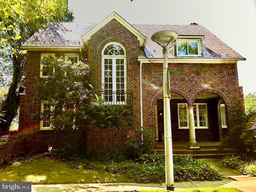 Charming, brick home in desirable Beverly Hills. Hardwood floors throughout with, 4 Bedrooms plus 2 additional dormer rooms on the third floor. Great potential with a  very spacious club room in lower level with full bath, detached 2 car garage, and a large deck off of the kitchen. Separate dining room, Library, Sun room, Living room right off of the foyer. Don't miss this great opportunity.