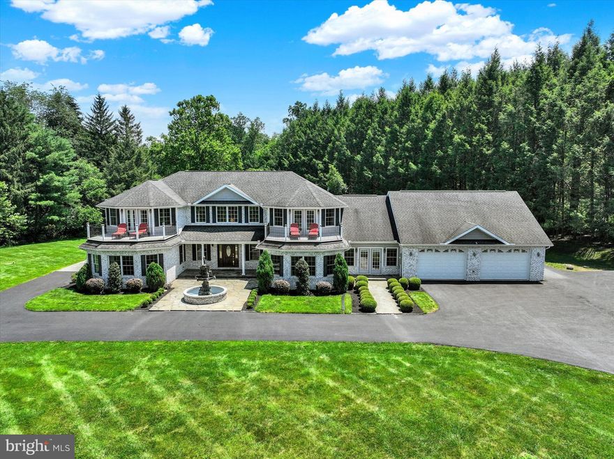 Welcome to your private estate nestled in the pristine woods just off Fishing Creek Valley Road. A secluded drive leads you to this stunning Mediterranean-style home, offering nearly 6,000 square feet of beautifully finished living space. Designed for those who love to entertain, the home features expansive formal rooms on the main level, ample exterior parking, a spacious and private rear yard ready for a pool, and a fully equipped commercial-grade bar on the lower level perfect for hosting gatherings. Step into the grand two-story foyer, where a split staircase and gleaming oak hardwood floors set an elegant, yet welcoming, tone. The newly renovated custom kitchen includes all the modern amenities you expect, highlighted by new granite, stainless steel appliances, including a Thermador 6 burner cooktop in 2021, a new GE Cafe Convection oven-microwave, new whirlpool dishwasher and an oversized island with seating for five and additional storage. A dramatic 2 story family room offers gas fireplace and motorized blinds. Just off the family room, a private office with a wall of windows provides abundant natural light—ideal for working from home. An additional family room adjacent to the kitchen offers even more living space and connects directly to the garage. Upstairs, you’ll find three generously sized bedrooms, with the two front bedrooms featuring private patios complete with composite decking.  The updated bathrooms throughout the home include new countertops and several upgraded vanities and showers.  Owners' suite features a private balcony, spacious walk-in closet complete with California Closets cabinetry upgrade, updated bathroom with soaking tub, 2 vanities and tiled shower.    The oversized garage accommodates up to five vehicles and includes a multiple, large storage rooms above. The fully finished lower level expands your living space with an in-laws quarters complete with fourth bedroom, full bath, full kitchen, exercise room, media room, and a professional-grade bar complete with a beer cooler. Outside, the well-maintained grounds offer multiple spaces for outdoor entertaining. Enjoy the large deck with a luxury Breeo fire pit and yet another bar area—fully outfitted with refrigerators and bar seating—or relax in the rear yard gazebo, perfect for taking in the beauty of nature during the spring and autumn months. All this plus a new furnace in 2020 for added peace of mind.  Located just a short walk from Boyd’s Nature Preserve and with convenient access to all areas of Harrisburg and Camp Hill, this home offers a peaceful, country-like setting without sacrificing accessibility.