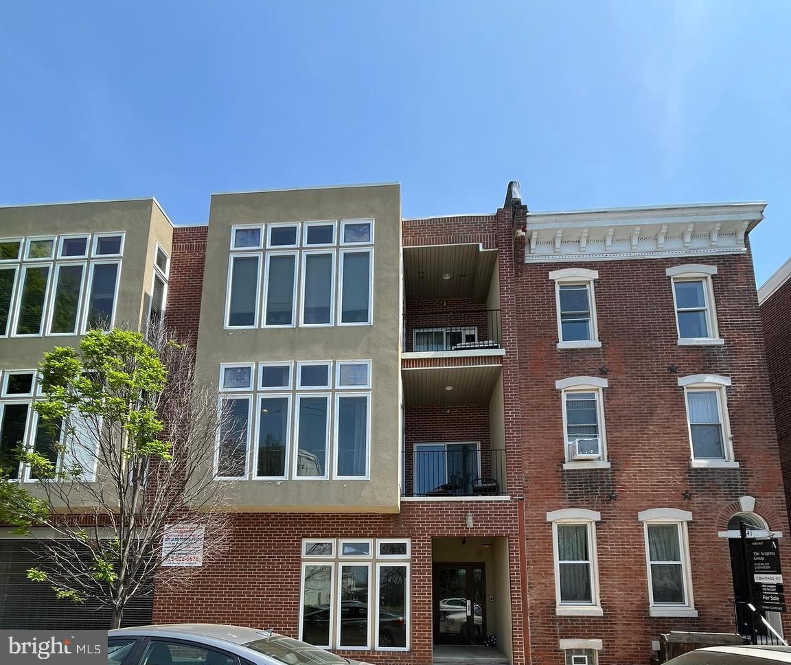 A beautiful newer construction condominium with 2 upgraded baths, a large primary bedroom with private outdoor terrace and a private den (which could be used as home office or second sleeping quarter). Located in the "Terraces at East Falls" development and built in 2008, this unit includes gated assigned garage parking for 1 car and access to an expansive shared roof deck with views of Center City. An open floor plan includes high ceilings, exposed ductwork, gas fireplace w/slate, hardwood flooring in living areas, new carpeting in bedroom & den, and recessed lighting. The Kitchen is modern including granite countertops, Loft style cabinets, and stainless steel Viking appliances. Other amenities include Central A/C, Gas Heat, and full size stackable washer & dryer. The property is centrally located to Center City, US Highway 1, 76 and Kelly Drive as well as close to the regional rail line.