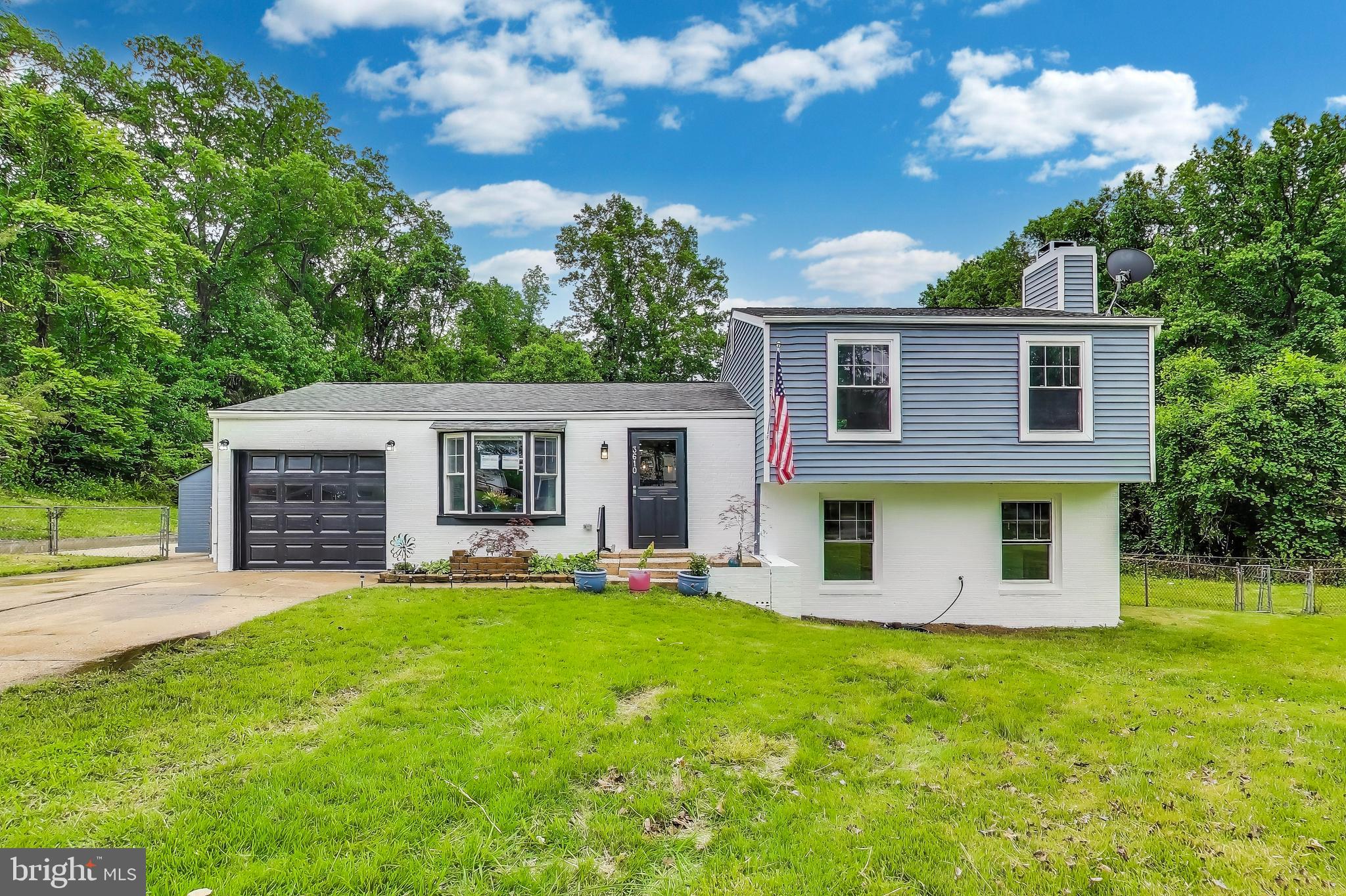 SHOWINGS BY APPOINTMENT ON SATURDAY JULY 26TH BETWEEN 1:15 - 2:30 PM. Requirements: Monthly income must be more than 3 times the monthly rent. No more than 2 incomes to qualify. Welcome Home to this completely renovation split-level at the end of a Cul-de-Sac with one of the largest acreages in sought after Maplewood! This home has been meticulously renovated top to bottom! Featuring an open concept kitchen with New Stainless Steel Appliances, Quartz Counters, and Island with a breakfast bar, generous storage and soft close drawers! The primary bedroom is located on the main level with vaulted ceilings, skylights, ceiling fan , Ensuite full bath and plenty of room for a king-sized bed. On the upper level you'll find the 2nd bedroom with a full bath, along with the 3rd and 4th bedrooms and a full bath in the hallway. The family room/recreation room is on the lower level with full bath and working fireplace. New LVP floors throughout. The finished laundry/utility room is complete with full size, front loading washer/dryer and extra storage, from which, is a level walkout to the side yard. In the back you'll discover the expansive two tiered deck with built-in, shaded, banquettes that is perfect for entertaining, BBQ's, or simply to relax and enjoy the wooded views leading to Tinkers Creek Park. Bonus Storage/Room is just off the kitchen along with a secluded patio and storage shed. A commuter's dream with easy access to National Harbor, Tangier Outlets, Old Town, Joint Base Andrews, National Airport, 495, 295, 210 and more! Application Fee $65.00 per adult. 2 year lease minimum preferred.