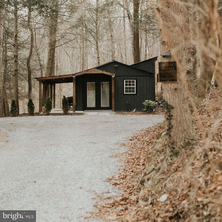 ***Do not drive by without an appointment, property is video monitored***Completely renovated in 2024, this charming 1-bedroom, 1-bath cabin offers the perfect blend of modern comfort and serene natural surroundings. Nestled alongside a peaceful creek, this property delivers a true getaway feel while featuring high-end updates throughout.
Step inside to an open-concept layout with luxury vinyl plank flooring flowing seamlessly throughout the home. The stunning new kitchen is complemented by a beautiful tongue-and-groove ceiling, creating a warm yet modern aesthetic. Relax by the electric fireplace or unwind in your private sauna for the ultimate retreat experience.
Nearly everything has been redone, including a new roof, new door and mostly new windows.  The home also features all new appliances and thoughtfully updated finishes throughout.
Outside, enjoy the newly added patio with pergola roof, perfect for entertaining or quiet evenings by the firepit area while listening to the creek.
Currently operating as a successful Airbnb with strong weekend bookings, this property presents an excellent investment opportunity or keep it as your own personal escape or everyday living.  A rare opportunity to own a fully updated cabin where just about everything has been redone, move right in and enjoy.
***Please do not drive by without an appointment, as the property may be occupied by guests***