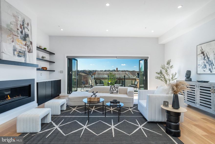 This exquisite end-unit 4-bedroom, 3.5-bathroom home boasts 3,283 square feet of luxurious
living space and is just five years young, located in the vibrant neighborhood of Manayunk.
Situated just a few blocks from Main Street, residents will enjoy easy access to a plethora of
shops, restaurants, boutiques, and art galleries. Spanning four stories, this modern home is
designed for both comfort and convenience. The grandeur of 11 ft. tall ceilings greets you
upon entry, while a 5-stop elevator ensures effortless access to every level. A 2-CAR GARAGE,
coupled with a driveway accommodating 2-3 additional parking spaces, provides ample parking
for residents and guests alike. Outdoor living is a delight with several outdoor areas, including a
rooftop pergola with a retractable awning, perfect for al fresco dining or relaxation. A beautiful
completely fenced-in side yard, running the full depth of the house, is perfect for a dog run or
additional parking. Inside, discover an array of fabulous features, including custom designed
walk-in closets, and a full-service laundry room for added convenience and a floating staircase with tinted industrial style wall of windows allowing for endless natural light but also the comfort of privacy. The heart of the home lies in the chef's kitchen, complete with both a 10-foot island and large peninsula, extra tall custom cabinets, wine cooler, commercial-grade refrigerator, freezer and wine cooler with additional
under counter wine storage, and a "Theramador" six-top burner high-end stove and appliances.
The adjacent living room offers built-ins with shelving units and a gas fireplace, creating an
inviting space for gatherings. Triple slider La Cantina accordion glass doors open onto an
elevated back deck with retractable awning, seamlessly merging indoor and outdoor
living spaces, ideal for entertaining guests and barbecuing. The fully finished basement provides
additional living or recreational space to suit any lifestyle. Retreat to the primary suite, boasting
a private balcony, his and her custom walk-in closets, and a lavish bathroom featuring remote-
controlled blinds, a soaking tub, heated floors, double vanity, and double water closets. Ascend
to the roof deck to enjoy expansive views and the ultimate entertainment space. With its
unbeatable location, luxurious amenities, and thoughtful design, this Manayunk gem offers a
lifestyle of unparalleled sophistication and comfort! *This property has 5 years remaining on the tax abatement.*