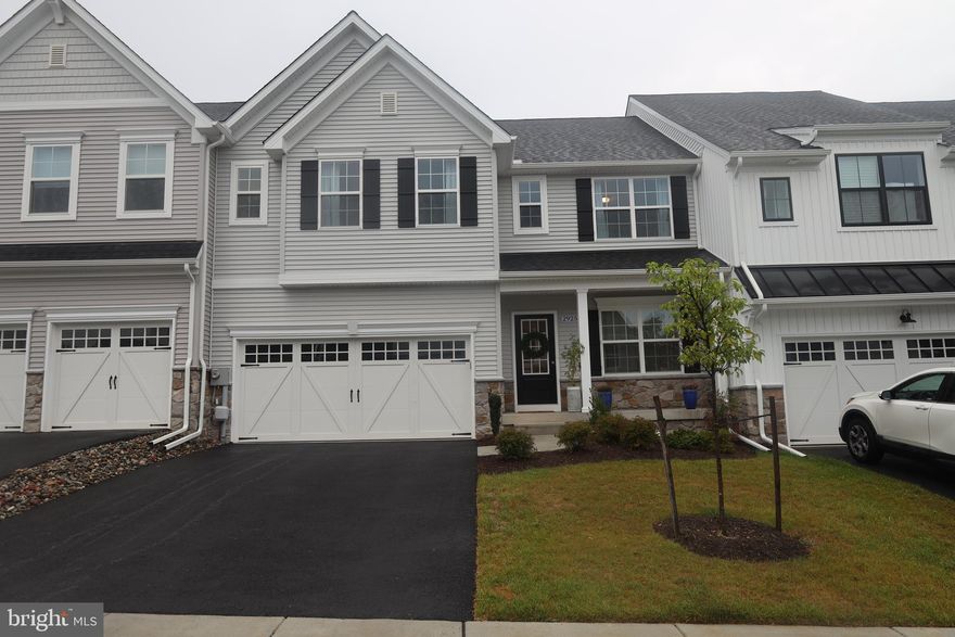 This highly sought after Kellerton neighborhood offers a vibrant community with endless amenities, including a resort style walk-in pool, large dog park, walking paths, basketball courts, covered pavilion, beautiful landscaping and clubhouse including gym, full kitchen, dog wash and outdoor firepit.
Just built in March 2025, this home feels brand new and carefully clean.  This villa style town home lives like a single family on the inside and on the outside is only attached to two other town homes.  The home is situated on a court and includes a two-car garage, driveway, front yard which is maintained/mowed by the HOA, backyard which faces the private tree lined perimeter of the neighborhood and a covered porch.  The main level includes an office with French doors, kitchen featuring quartz countertops and a spacious island, vaulted ceiling living room featuring gas fireplace, dining area, laundry room and primary bedroom which includes a walk-in closet and bathroom with floor-to-ceiling tile in the shower and a double vanity.  The entire main level has vinyl plank floors.  The upper level includes a large loft space which overlooks the open concept living area on the main level, a bathroom with another double vanity, and 2 oversized bedrooms, both with walk-in closets as well.  The basement includes a large, open living area and large unfinished storage area  which includes storage shelving.
Lease will run through May 31, 2026, with the potential to renew.  Dogs of any size welcome for consideration.