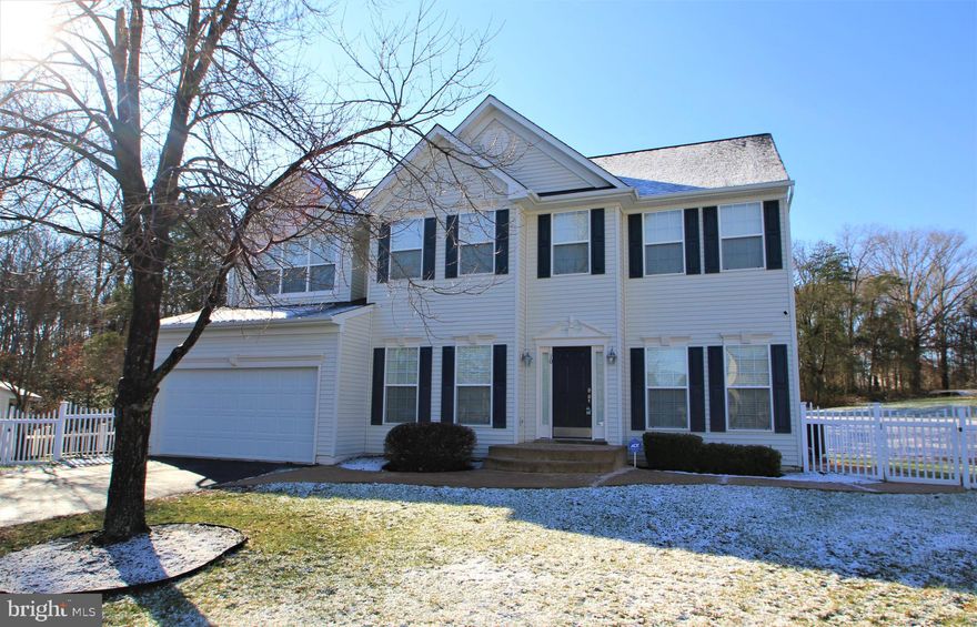 Beautiful Colonial on Cul-De-Sac Lot w/ Fenced Backyard.  Spacious Open Floor Plan Loaded with Upgrades. Window Filled 2 Story Family Room with Gorgeous Floor to Ceiling Stone Fireplace.  Gourmet Kitchen with Large Island, Custom Cabinets, and New Stainless Appliances.  Master Suite with Walk-in Closet and Luxury Bath.  Oversized Bedrooms with Lots of Storage Space.  Upper Level Laundry Room with Built-ins.  Finished Garage with Built-in Cabinets.  Rear Deck Overlooks Stamped Concrete Patio and Large Fenced Yard Backing to Trees.