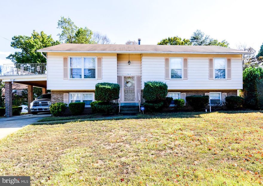 Nice 4 bedroom, 2 bath split foyer home. Basement has a nice rec room with a fireplace and a side entrance.  Basement has a bedroom and a bonus room which can be used as another bedroom with a large window.  The room with the bar is also separate from the rec room.