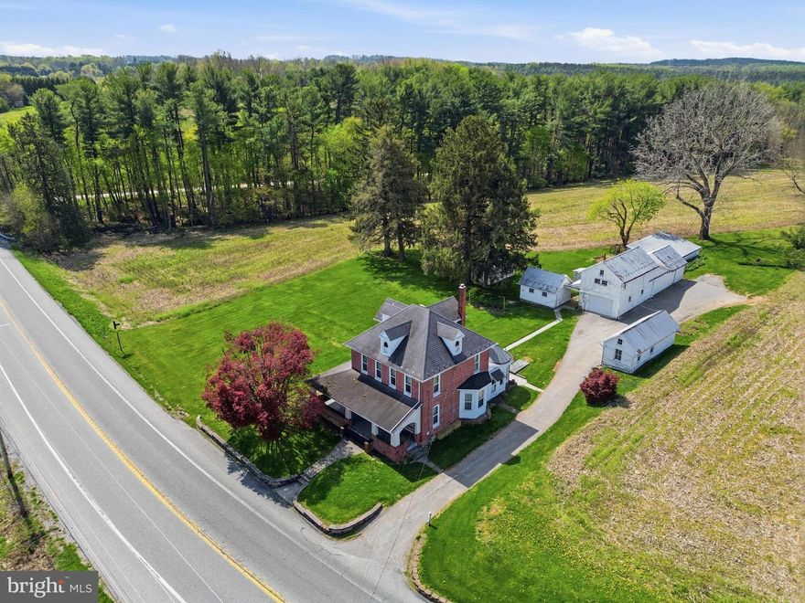 4 bed, 2 bath farmhouse with 3 acres active in south Hanover! This property has big potential as it can be used for residential use or can be used as a commercial property for your business with the commercial/industrial zoning! There are a variety of outbuildings and barns on this parcel, with a few of them being used as garage space for the current owners. This could be an excellent location for a commercial property with high traffic volume passing daily. It is also great for someone who wants some space around them and enjoys older farmhouse architecture, quality, and/or homesteading.