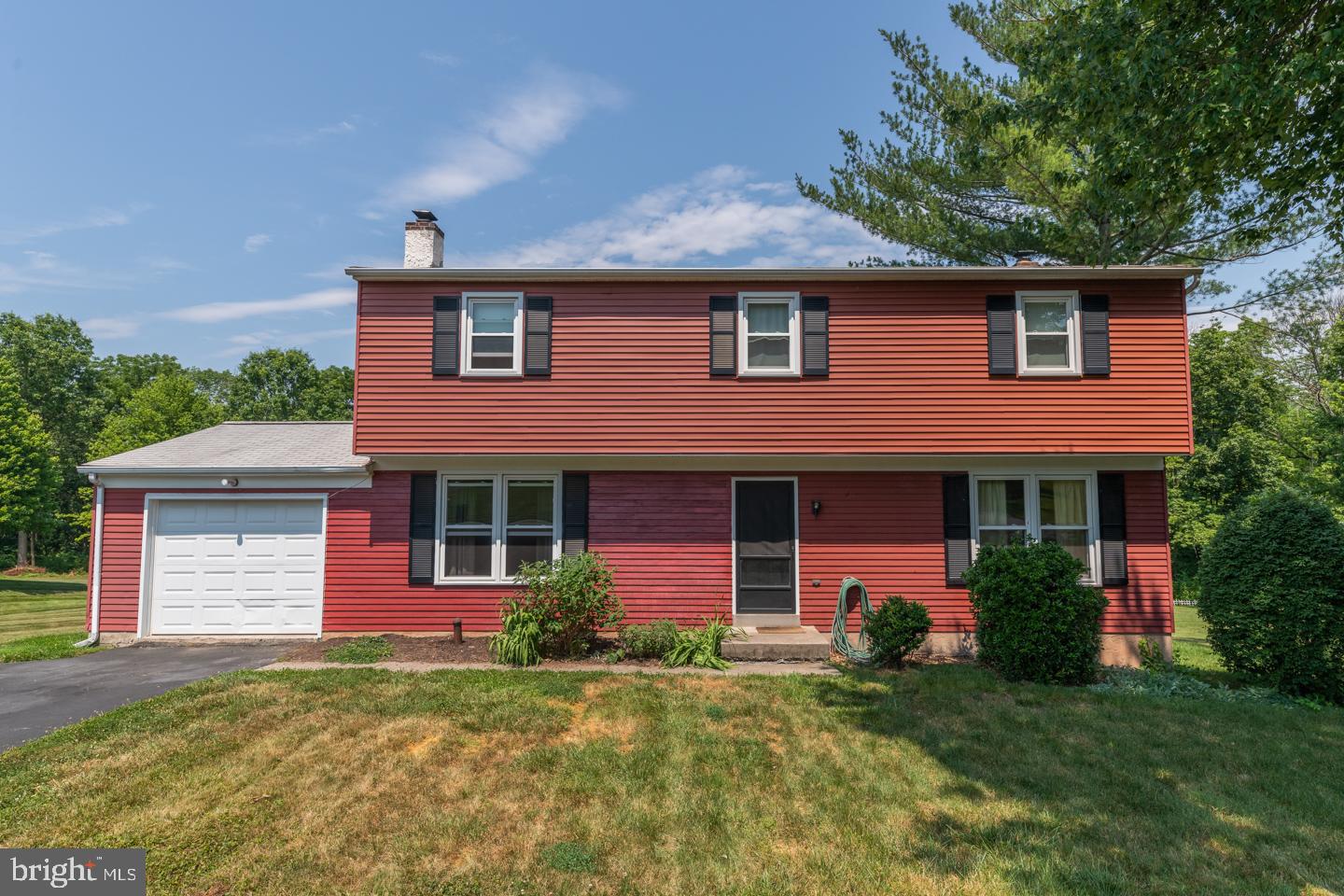 Welcome to this spacious 4-bedroom, 2.5 bath home on a large lot in the highly sought-after Regent Manor Neighborhood. The first floor offers a large living area, complete with a lovely wood-burning fireplace, eat-in kitchen, and formal dining room. The ground level also offers a half-bath and full laundry room, with access to the garage and to your secluded backyard. There are four bedrooms on the upper floor and there is plenty of space for all your family s needs. The backyard is spacious and has plenty of opportunity to create the outdoor living space of your dreams. With easy access to shopping and dining, this home in the North Penn School District is a definite must-see!  This solid house with walk-out basement on a beautiful lot and unbeatable location needs just a few cosmetic updates to transform into your perfect, forever home!