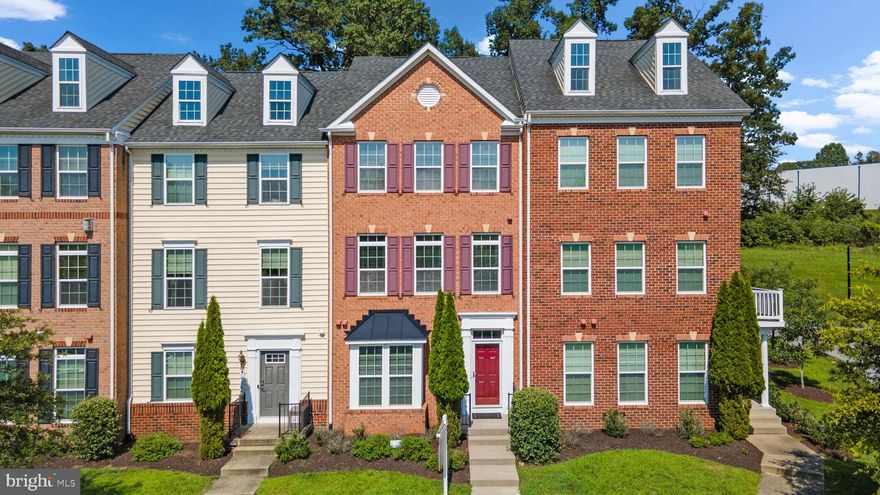 Welcome to RAINCLIFFE, located in the charming historic section of Sykesville! This beautifully maintained 3 BR, 2 full & 2 half BA townhome is nestled in a highly sought-after and convenient neighborhood. A rear-entry 2-car garage opens to a finished lower level with a rec room, half bath, and laundry area—ideal for flexible living. The main level features hardwood flooring, high ceilings, and an open-concept layout. The gourmet country kitchen offers granite counters, stainless steel appliances, and a center island, flowing seamlessly into the bright living and dining areas. Step out to the rear deck—perfect for entertaining or relaxing. Upstairs, the spacious owner’s suite includes a soaring cathedral ceiling, walk-in closet, and luxurious bath with dual vanities, soaking tub, and separate shower. Two additional bedrooms and a full hall bath complete the upper level. Just a short walk to Freedom Park and minutes to downtown Sykesville, Piney Run Park, shopping, and major commuter routes. This home blends comfort, style, and convenience—don’t miss it!