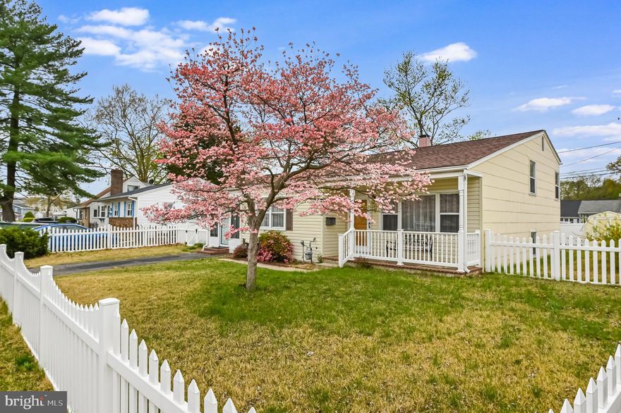 This quaint home has been lovingly cared for for decades from its custom made breakfast nook seating to the  shelving in the lower level bedroom.  There is a fenced rear yard w/ 2 sheds w/ electric.  2 of the 3 floors are all hardwood & tile. The sunroom has both front & back entries, sliding glass windows galore to open in 3 seasons & a pellet stove to keep you warm in the colder months.  The LL laundry/Utility room has a sink and commode.  Water heater & roof recently replaced.  Lovely older neighborhood w/ sidewalks,  easy access to stores, restaurants & major routes & a short walk to Furnace Creek.