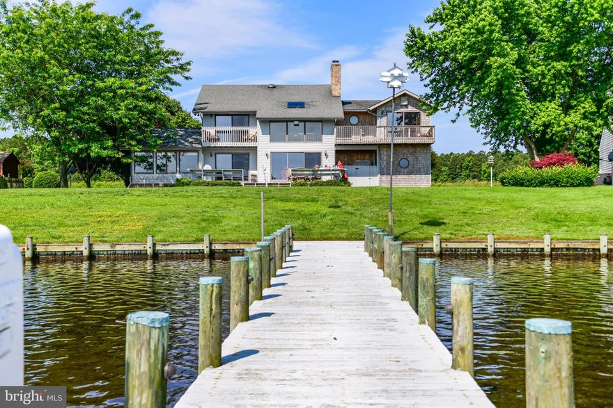 Panoramic views of the Wicomico River from this waterfront contemporary! This 2600 sf+ home offers rear walls of glass, 2 second floor balconies, beautiful tiled sunroom, 2 zone geothermal heat and more! 112 feet of bulkhead, 75 ft dock & 5 ton boat lift. 20 minutes by boat to the Chesapeake Bay and beyond! There is absolutely no better location on the Wicomico!