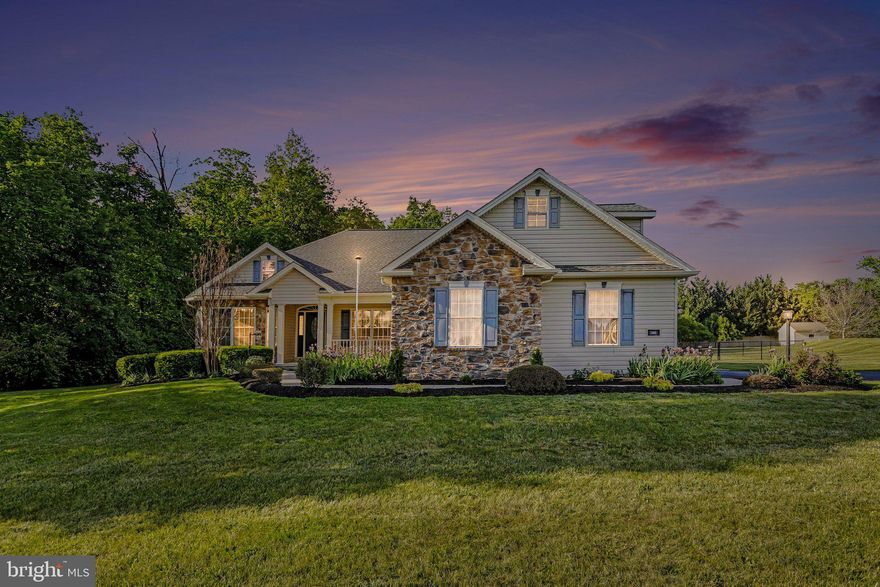 Welcome to this beautifully updated 3-bedroom, 2 full bath rancher with a versatile bonus room over the garage—ideal as a potential 4th bedroom or private retreat. The open, split-bedroom layout offers both functionality and privacy, with the spacious primary suite on one side featuring a fully remodeled luxury bath (2019) with a slipper tub and walk-in tiled shower, while two additional bedrooms and an updated hall bath (2022) are located on the opposite side. The great room with cathedral ceilings and a cozy pellet stove insert flows seamlessly into the dining area and a beautifully remodeled gourmet kitchen (2022)—perfect for everyday living and entertaining, with easy access to outdoor living, including a screened-in porch and an herb garden just steps away. Beyond, enjoy a peaceful backyard setting where a wooded backdrop provides a natural buffer and creates a true bird watcher’s paradise, complete with raised garden beds, pear trees, established blackberry araspberry bushes, along with a fenced-in yard for added convenience.

The expansive finished basement offers incredible flexibility with multiple defined spaces, including a media area with surround sound, playroom or game space, a beautiful furnished home office, two generous closets, and large storage/utility rooms—ideal for a variety of lifestyle needs.

A unique blend of extensive quality updates, totaling nearly $200,000—including a brand new roof (April 2026)—flexible living space, and a serene backyard setting make this home an exceptional offering and long-term value.