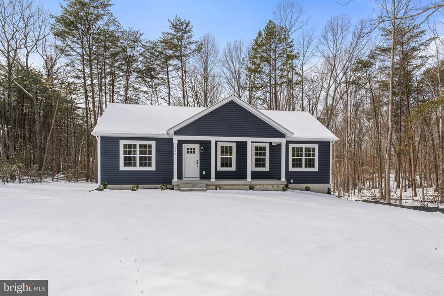 Completed New construction - The Boxwood from Ironwood Homes on 5.75 acres. Simple, yet elegant, this modern reinterpretation of country chic is the perfect home in which a young family can grow. The Boxwood’s open floor plan creates a bright and airy atmosphere. Each home is expertly fashioned with a luxury primary bathroom, farmhouse sink, exposed natural beams, and much more to give it a uniquely custom feel. Gorgeous 5 bedroom 3 full bath ranch home! Granite countertops and stainless steel appliances in the kitchen. There are tons of upgrades throughout the home- free-standing tub, hardwood floors, custom-look light fixtures, and gorgeous tiles! A completely finished basement provides another bedroom, a full bath, and a large recreation area! You don't want to miss this opportunity! Super close to the town of Louisa and 1-64 on ramp.