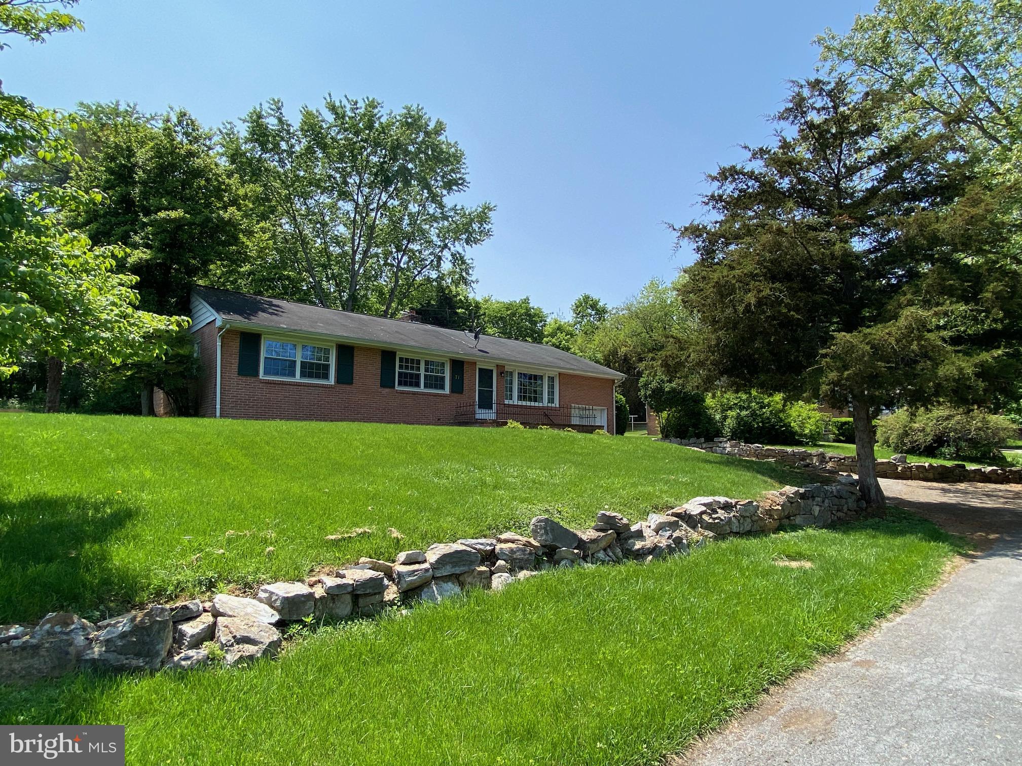 Adorable 3 BR, 1BA Brick Rancher on 1 level just outside of Shepherdstown across from Middle School. Wood floors, fireplace in family room & wood stove in living room. Everything on one level. Washer/Dryer. Unfinished basement & 1 Car garage. Electric heat & air. $1,700/mo. & $1,700 security deposit. Pets considered on a case by case basis only and will be required to have 2 months rent in security. Pet addendum applies. Property is currently on city water and a septic system. The property will connect to city sewer in the near future. At that time, the tenant will be responsible for sewer charges on their water/sewer bill from the Corporation of Shepherdstown. Note: Owner prefers strong, credit worthy applicants. Credit and criminal back ground checks apply. $40 on-line application obtained on listing agency's website.