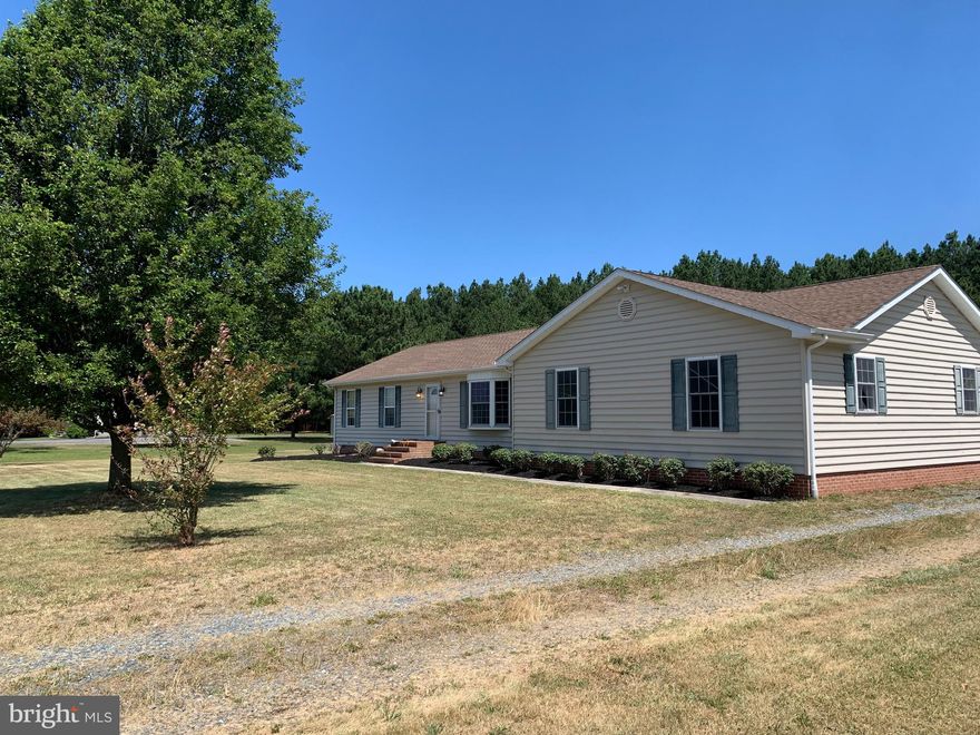 This 3 bd 2 ba charming rancher is located just outisde of Princess Anne and sits on 2 acres in a quiet country setting. This home has alot to offer, including an inground salt water pool with a new pool liner, cover and pool pump, the pool filter was replaced 3 years ago.  The pool is also fully fenced with newer vinyl fencing. The home has a large attached two car garage with lots of room for tools and storage, there is also a storage shed on the property for extra storage as well .  The roof was replaced 3 years ago by Spicer Brothers, the HVAC system was recently serviced and had the blower motor replaced. The home features fresh paint in all rooms, newer laminate plank flooring in the kitchen, new fire alarms throughout, and new ceiling fans. This home is turn key ready for its next owners to enjoy. Included in sale with an acceptable offer such as stackable tool chests, deep freezer, air compressor, and lots of tools, along with a John Deere D105 riding lawn mower. Schedule your private showing asap to view this awesome property before its gone! Home sold AS-IS.