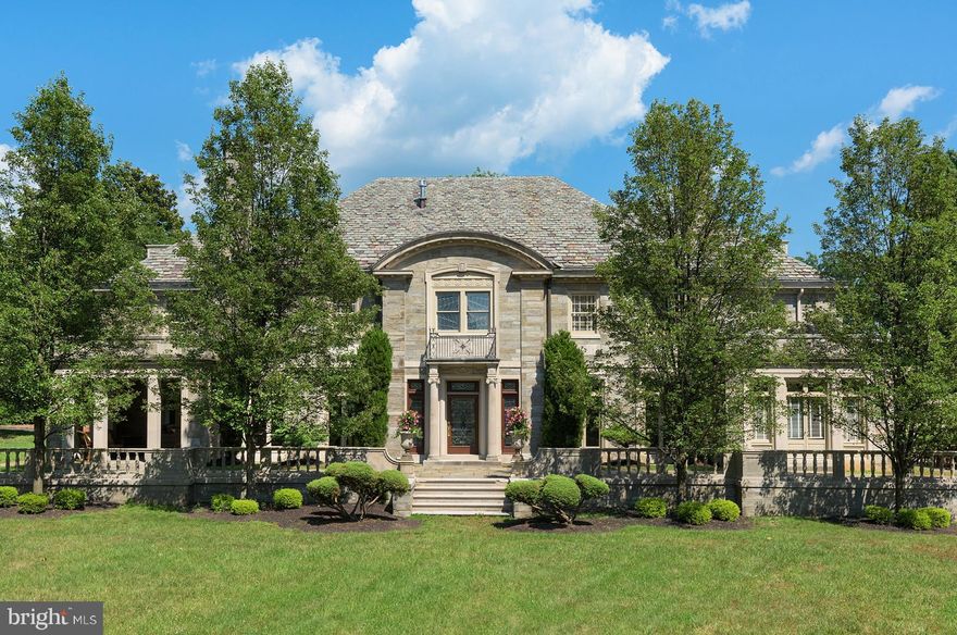 This Magnificent "One of a Kind" Mansion designed by the famous Philadelphia architects Rabenold & Seyburger has been restored and updated to perfection. Enjoy all the artistry of marble floors and Ornate Fireplaces and Fine architectural details in wood paneling, crown molding, and built ins. The gorgeous staircase features a barrel ceiling and Impressive Leaded stained-glass windows and doors. The huge gourmet kitchen opens to a breakfast area, wet bar and Sundrenched Family Room with Built-ins and Fireplace. The formal Dining Room and Livingroom flank a spectacular marble Entry both with gorgeous original fireplaces. The Fountain Room off the Formal Livingroom is freshly painted and features custom tile work and windows galore. Upstairs relax in the Library or experience the Luxury of a Huge Master Suite with Steam Shower, Dressing Area, Private Laundry and his/hers closets. The Two Additional Bedroom Suites on this floor feature gorgeous updated original baths. The third-floor houses 5 great size bedrooms and a black and white tile hall bath. A rear foyer connects the kitchen area with the garage and a fantastic In-Law Apartment above with white kitchen, granite tops, gorgeous tile bath, living room and bedroom. Room count includes the apartment. The Lower Level includes a snack bar area adjacent to a huge Home Theater and playroom. There is a laundry area and Pool access with His/Hers Bath and changing rooms...Outside enjoy a lovely kidney shaped pool, state of the art Sport Court and bocce court. This classic home offers everything todays family looks for!