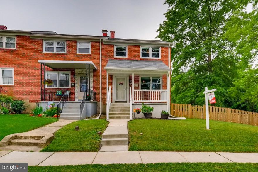 Multiple offers received. Please submit best and final Thursday June 3rd by 6:30 pm. No escalation clauses accepted. Thank you!  One of a kind townhome in Oakleigh. Large fenced in yard on corner lot. Slider to back deck. Open floor plan. New fence (2019). Updated Kitchen and Bathroom. New Vinyl windows (2015). New Roof (2015). Brand new porch and sidewalks(2016). Stainless steel appliances. Wide plank laminate flooring on main level.  Induction cooktop. Smart keypad. Nest Thermostat. Great location in Parkville, near 695/95/83.  This will sell fast. Don't hesitate.  Complete installed Vivint security system (doorbell camera, exterior camera and indoor camera) included with purchase. Buyer to arrange for monthly monitoring if they choose to do so.  Agent owned property.