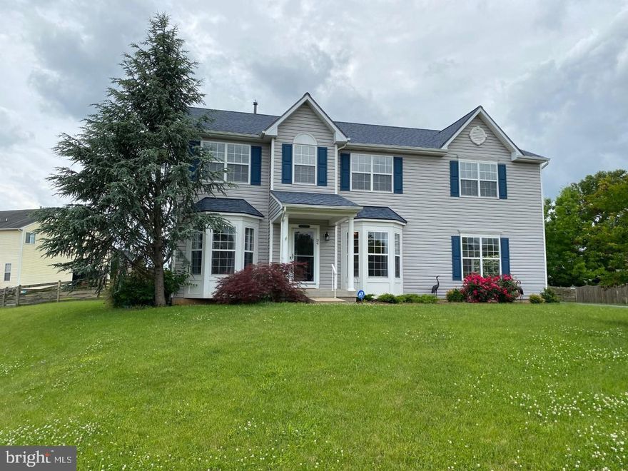 Remarkable Rental home 5 bedroom 3 full bath.  Fresh paint, side loading garage, fenced in back yard, composite back deck.  Home features a huge master bedroom suite with private bath and walk in closet.  Laundry is upstairs also.  Remodeled kitchen, security system, newer appliances, a sunroom, a formal dining room are other nice touches.  The basement is an ideal storage place.  A full bathroom is available on the main floor, public water and sewer.  Plenty of space to live in and a very bright and open feel.  A must see!