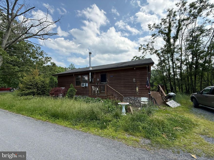 Priced to sell - ideal for a starter home or investment! This property offers a great opportunity with plenty of potential. It is serviced by a community well, and the septic system is believed to be shared with a neighboring property. Due to the unique utility setup, buyers are strongly encouraged to perform their own due diligence. Property is being sold as-is.