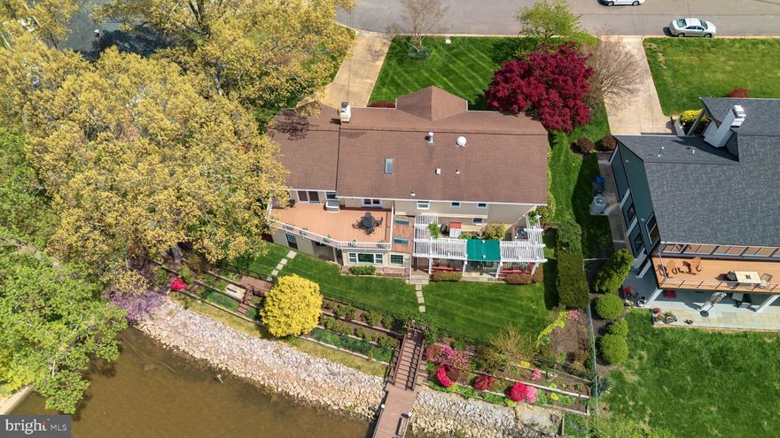 Welcome to this stunning waterfront home, beautifully maintained and in immaculate condition. Step into a spacious foyer that leads to the rest of the house. 

The home boasts a beautifully updated gourmet kitchen with ample storage, stainless steel appliances, upgraded floor tiles, a skylight, an eat-in breakfast area , and a walkout to the new composite deck or relax in the expansive family room featuring a vaulted ceiling — all enhanced by a stunning view of Little Hunting Creek.

Retreat to the double-sized primary bedroom with an ensuite bath. The primary bedroom is generously sized and can easily be reconfigured to include a luxurious walk-in closet. Imagine converting the back wall to paranomic windows so you can enjoy the expansive view of the creek.

Outdoor living is a dream here: a large composite deck on the main level provides breathtaking views of the water, while a Bluestone patio with a pergola offers a tranquil space for entertaining. The riprap shoreline and terraced garden ensure beauty and lasting protection against erosion. Boating enthusiasts will love the private pier complete with both a fixed and floating dock, and the navigable water offers direct access to the Potomac River.

The fully finished lower level features a cozy recreation room with a fireplace and wet bar, as well as a light-filled sunroom with panoramic views and walkout access to the patio.

Enjoy the convenience of a two-car garage pre-wired for EV charging and a beautifully landscaped fenced backyard, along with a dedicated gardening station tucked behind the garage for green thumbs. Additional highlights include: a whole-house generator, gas heating and water heater, built-in storage shed, pull-down attic access with a semi-finished storage space, and irrigation system.

This sale include Out lot 1111 15 0010A that extends almost to the middle of the Creek!

Please note, the seller requests a minimum 60-day rent-back period after settlement.