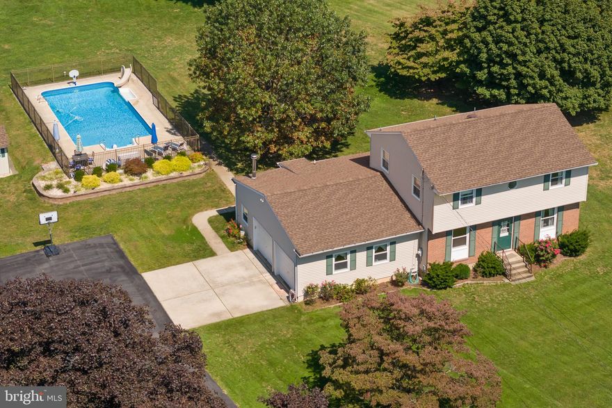 JUST REDUCED! This beautiful property, a country oasis, sits on a two acre lot.  There is plenty of room for a garden, play and outside activities. For additional outdoor entertainment, there is a beautiful salt-water inground pool for your enjoyment with plenty of room for your lounge chairs and tables as well as a pool shed. There is also a 25X10 patio outside in back of home. Long driveway and parking area gives your company ample parking. The first floor features an extra-large living room, and a large eat-in country kitchen with granite countertops and double oven. There is a room with built-ins currently used as a den/office, that can become a dining room, playroom, family room. Addition to the first floor include a pantry, full bathroom, laundry room, linen and coat closet.  Off the kitchen find a four-season sun porch to a relax with a morning coffee and view to all the outside activities.  The second floor has four bedrooms and a full bath.  The roof is 5 years old, HVAC is 1 year old with a heat pump, forced air/baseboard back up is multiple zones. There is also a wood stove near garage that can be used as a backup to heat the home as well.  There is a large two car attached garage and a garden shed in the yard as well. (Shed conveyed "as is.”)This lovely home is close to major highways, shopping and desirable school systems.  Come see for yourself!
Interior photos coming soon. Showings to begin 10/10. 
OPEN HOUSE, Sunday, October 12th 1:00-3:00pm.