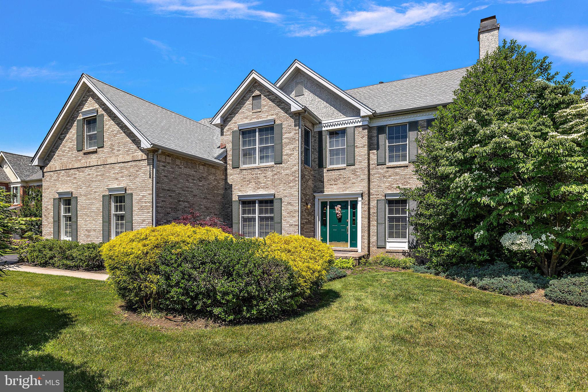 Welcome to 525 Annadale Drive, a stately brick Colonial home nestled in the highly sought-after Tredyffrin-Easttown School District. As you step into the large, beautiful foyer, you’ll be greeted by the warmth of hardwood flooring that flows throughout the entire first floor. Behind double doors, a private study with dark cherry built-ins offers a quiet retreat. The expansive living room, just off the front door, features detailed wallpaper, chair railing, a focal fireplace, and an overhead beam with recessed lighting, adding depth between this space and the attached formal dining room. The kitchen is a chef's dream with white cabinets, granite countertops, a large island with seating, stainless steel appliances, white double wall ovens, a white tile backsplash, recessed lighting, and a spacious pantry. A large open passthrough overlooks the bright sunroom, wrapped in windows, perfect for soaking in natural light. The serving station with electrical outlets separates the eat-in breakfast space from the family room, which boasts a two-story ceiling, a focal brick fireplace, and a rear set of stairs leading to the second floor. The first floor is completed by a powder room and a separate laundry room/mudroom combo. Upstairs, the large master suite features a sitting area and a huge walk-in closet. The master bath is a luxurious escape with tile flooring, a large soaking tub, a walk-in tile shower, and his-and-hers separate vanities. Down the hall, you'll find three additional bedrooms, one with a Jack and Jill bathroom, and the last with a conveniently located hall bathroom. The basement, with its 9 ft. ceilings, is ready for your finishing touches. Outside, a large rear deck offers a private oasis with a tree-lined lot and beautiful mature landscaping and flower beds. This home is a perfect blend of classic elegance and modern amenities, ideal for comfortable living and entertaining. Close to major routes of transportation, restaurants, shoppes & boutiques. This is one you are going to want to call home!