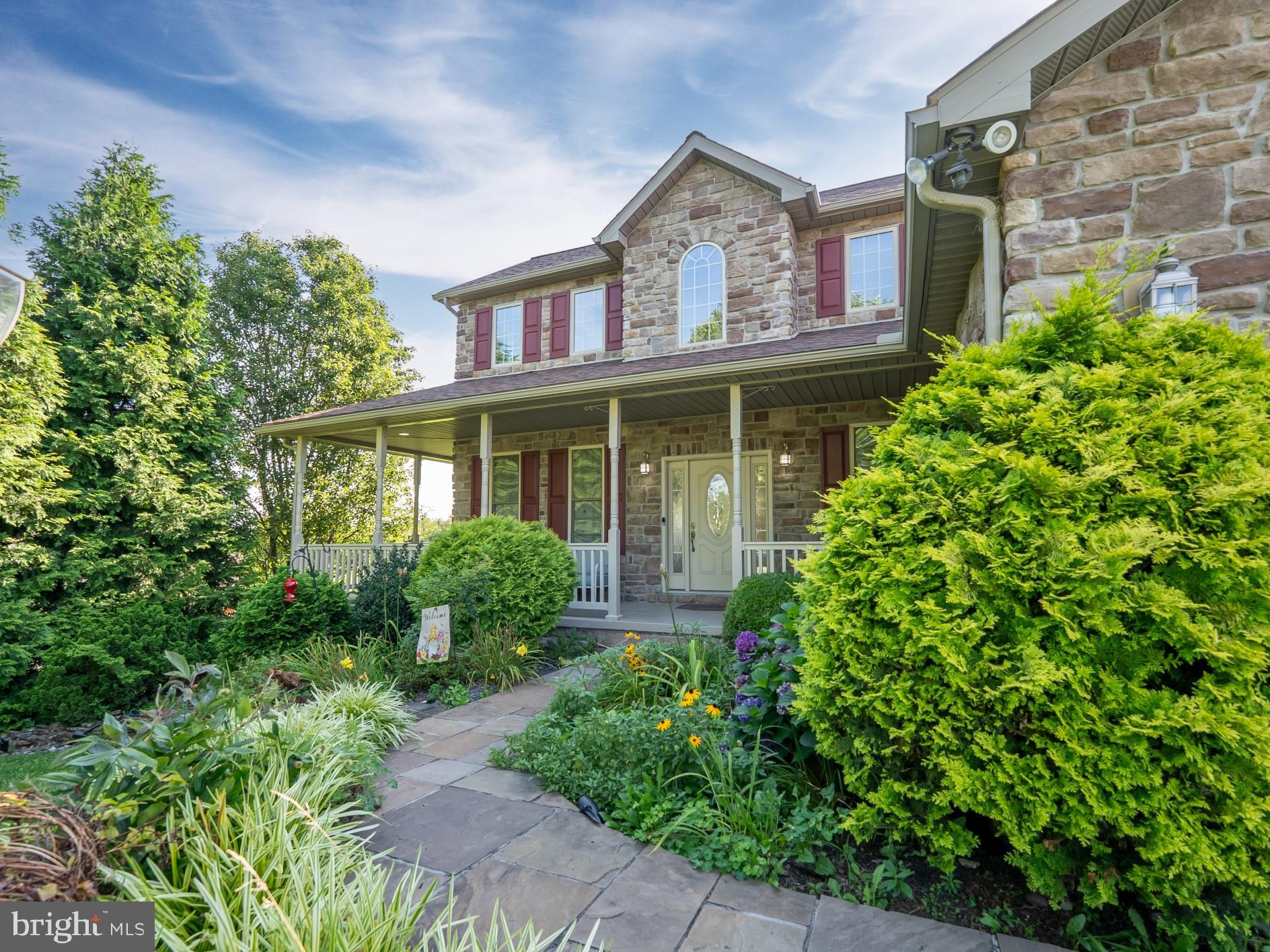 Step into 1458 Highfield Court and discover a charming stone home surrounded by beautiful, lush landscaping. This three-story property features four bedrooms, three bathrooms, and a fenced yard. The interior boasts hardwood floors on the main level, with new carpeting installed upstairs and downstairs. The primary suite, located on the main level, features a large walk-in closet and bathroom with large tub. The spacious kitchen has all new appliance package. The property showcases extensive hardscape, a serene backyard, amazing views, and a lower garage out-back providing additional storage.