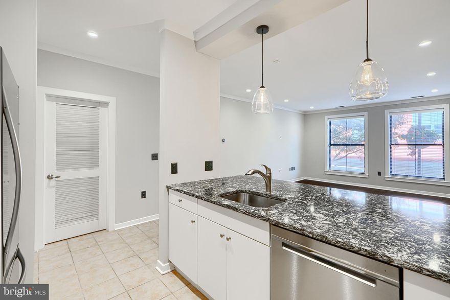 -Bright and Beautiful modern condo at Woodberry/Hampden-Elevator building-THE AMAZING POOL and secured parking- secured entry and deliveries- Enjoy the common outdoor spaces and rooms. Across from Woodberry Kitchen- Enjoy this peaceful setting- yet the convenience of City life- Peaceful sounds of the stream running and birds chirping. Close to restaurants- light rail-- Light rail goes to BWI- Enjoy the amazing pool and outdoor space for entertainment- rest and relaxation. 2 bedroom- 2bath- granite tops- Stainless appliances- Separately deeded parking space in garage- conveniently located close to unit. Water included in condo fee- Move right in and start enjoying your next chapter- Walk to Woodberry Kitchen- Waverly Brewing Co.- La Cuchara- The Whiskey Bar- Artifact Coffee- Union Collective-Show and sell today!!