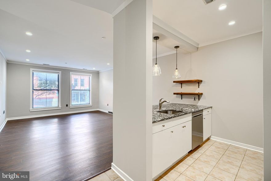 -Bright and Beautiful modern condo at Woodberry/Hampden-Elevator building-THE AMAZING POOL and secured parking- secured entry and deliveries- Enjoy the common outdoor spaces and rooms. Across from Woodberry Kitchen- Enjoy this peaceful setting- yet the convenience of City life- Peaceful sounds of the stream running and birds chirping. Close to restaurants- light rail-- Light rail goes to BWI- Enjoy the amazing pool and outdoor space for entertainment- rest and relaxation. 2 bedroom- 2bath- granite tops- Stainless appliances- Separately deeded parking space in garage- conveniently located close to unit. Water included in condo fee- Move right in and start enjoying your next chapter- Walk to Woodberry Kitchen- Waverly Brewing Co.- La Cuchara- The Whiskey Bar- Artifact Coffee- Union Collective-Show and sell today!!