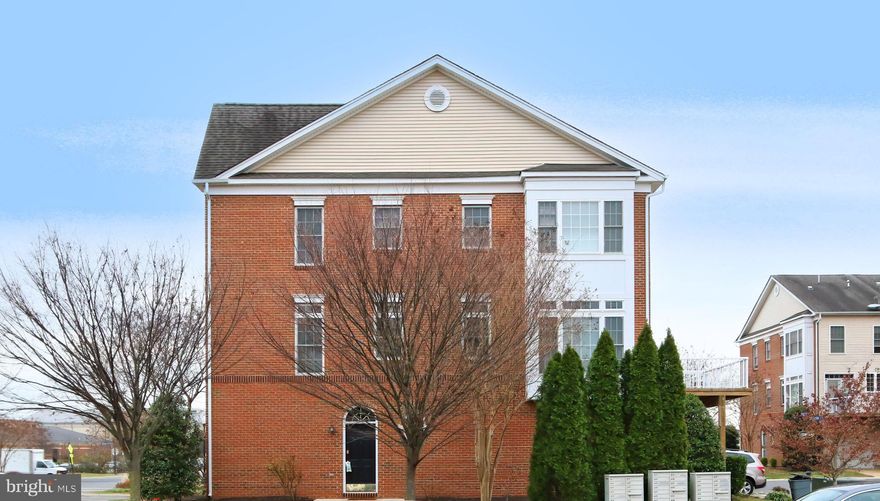 **OPEN HOUSE - NOVEMBER 16 BETWEEN 11AM-12PM**Welcome home to this  end unit TH with an attached one car garage and driveway!  This light and airy home features hardwood floors in the foyer and all through main,  granite countertops in the kitchen with ample cabinetry, stainless steel appliances including new stove and microwave (2021) and all others replaced in 2019 and corian countertops in the bathrooms.  On the upper level are spacious dual master bedrooms in the upper level with vaulted ceilings and their own dedicated baths, as well as a private bedroom on the first level with a full bath.  There's also an oversized 1 car garage with storage and a driveway.   What's wonderful about this home is that it fronts  to the common area with extra, open  parking all around!   Across from the Dulles South Rec center with pool, skateboard area, and playground, easy access to all the amenities of South Riding, within walking distance to shopping center, close to major roads and the airport and much more!