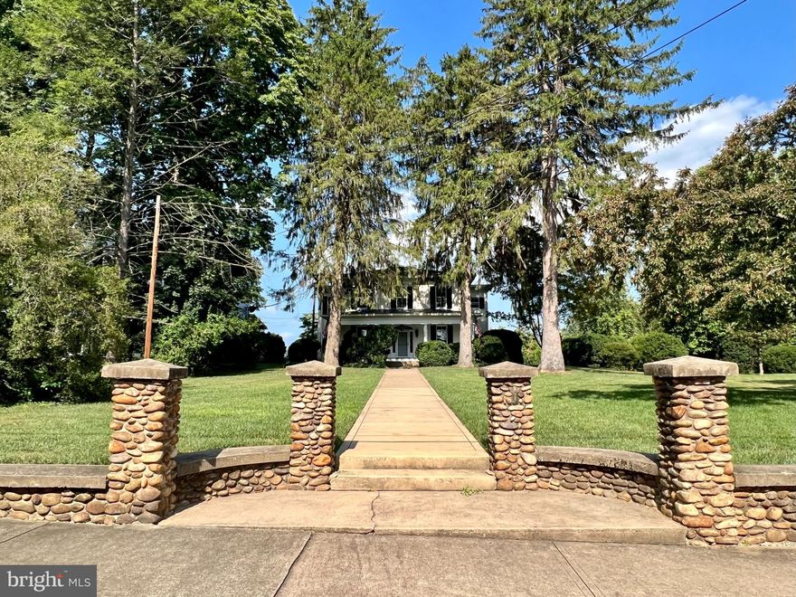 Located next to Jefferson Memorial Park on a corner lot with a private rear driveway, this is your chance to live in one of downtown Charles Town’s historic homes and is truly a MUST SEE!
Set back from the residential street, this home’s walkway is flanked by evergreen trees and you are welcomed by an expansive front porch - perfect for relaxing. The well cared-for home features a first floor with large foyer, formal living room, dining room, family room, remodeled kitchen with new appliances including a double over and propane stove, 3 fireplaces, laundry room with washer and dryer, and a “bonus” room with full bath and closet - perfect for an office, den, or guest room!
The kitchen provides access to the rear patio and yard - perfect for entertaining. There is a detached outbuilding that can be used for additional storage starting November 1. An unfinished basement with both an interior and exterior entrance is also available for storage.
After climbing the magnificent staircase with wooden banisters to the second floor, you’ll find a well-lighted foyer with window seats and access to the primary suite, 4 additional bedrooms and 2 additional baths. The luxurious primary suite features include a large bath with two vanity sinks, heated floor, heated toilet seat, a dual rainfall shower system, and a walk-in closet. 
Residents are within walking distance of local shops and restaurants; and have quick access to commuter routes WV-9, WV-51, Rt 13, and US-340.

Please Note: First floor is propane heat, second floor is electric heat. BACK UP heat is oil burner. There is also a wood stove.

Rent includes renters insurance and Second Nature Filter Subscription.

Pets are Case by Case. Two (2) Pets Max, under 30 lbs only. 

EHO.