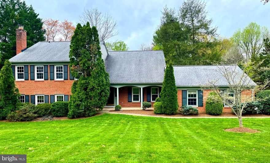 Elegant all brick rambler on sought after beautiful Cornell Rd, alongside the Army-Navy country club. 3,272 above grade finished SQFT and  0.78 acre level lot, fringed by trees. Fresh paint, new carpets, and light fixtures throughout.
Main level with kitchen, dining room, living room. French doors from dining room to large screened in porch with brick flooring that overlooks the expansive back yard.  Upper level offers a spacious primary bedroom suite:  primary bathroom, dressing area/sitting room, row of closets.  Three additional bedrooms, and a second full bathroom.  Lower level features a large family room with a wood-burning fireplace. Full  bath, laundry and spacious storage space completes this level.  Room and windows to create a 5th bedroom very easily in this laundry/storage space.  Enjoy proximity to Old Town Fairfax and watch the spectacular Fairfax City 4th of July fireworks from the back yard and driveway.  Conveniently located nearby local schools (Fairfax HS, Daniel Run, and St. Leo's Catholic school).  Two community parks, and quaint downtown Fairfax City offers many restaurants, a new music venue and pubs.  Easy access to all the commuter routes including 495 Beltway, Rt-50, 66. Short walk to commuter bus stop and just 3 miles to Vienna metro.  Mosaic Shopping center also nearby.   Home is an estate and being sold strictly AS IS, although move in ready and in good condition. Freshly painted throughout, new interior lighting and new carpet 2024. Open Sunday April 21, 2-4 pm.