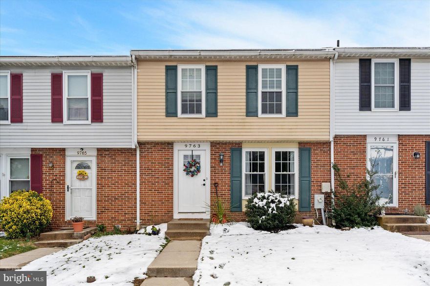 GORGEOUS 3 Bedroom 1.5 Bath BRICK Front Townhome in Parkville * Features Include:  Updated SPACIOUS sun filled eat-in kitchen with WHITE subway tile backsplash * TREX deck *  Recessed lighting in living room * crown molding and chair rail * The UPPER level offers three bedrooms and a FULL bath * On the LOWER level you will find a COZY family room, HALF bath, laundry and sliders that lead to a COVERED patio * LARGE fenced yard that backs to trees * A METICULOUSLY maintained home that will not last long * A MUST SEE!