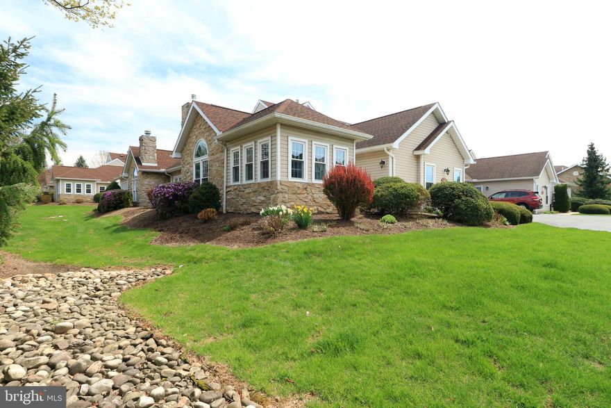 Beautifully updated and pristinely maintained one-level Thoroughbred Crossing condo!  Pull into Thoroughbred Crossing and notice the well-maintained landscaping and grounds, and the lovely clubhouse and outdoor pool.  Beautiful flowers and a nice front patio welcome you as you enter the foyer and notice expansive LVT flooring and an open floorplan concept.  The large great room with it's vaulted ceiling, Palladium window, and gas fireplace is the perfect spot to relax or entertain and is open to the dining area and the remodeled kitchen.  With quality white cabinetry, quartz countertops, stainless steel appliances, a pantry with pullouts, and recessed & under cabinet lighting you'll love cooking in the modern kitchen.  The primary suite features a large bedroom with a tray ceiling, a ceiling fan, dual walk-in closets, and an ensuite bath with a double sink vanity.  There's also an ample sized guest bedroom with a walk-in closet and a full bath beside it.  The sunroom/den with its many windows and French doors can be used as a sitting room, office, music room, TV room, or even another guest room.  A mudroom/laundry room with a utility sink and an oversized two car garage with an epoxy floor, plentiful shelving, and pulldown stairs to the storage attic complete the home.   All of the major systems and appliances have been replaced including the HVAC system (2018), windows (2019), water heater (2017), and roof (2016).  A short distance to the clubhouse and pool, and a short walk to the Blue Course Drive bike path make this a great location within the community.  Conveniently located close to parks, bike paths, Gigi's, and The Waffle Shop and not far from downtown State College and Penn State's campus, yet in a tucked away setting.  Easy living - come see this gorgeous condo today!