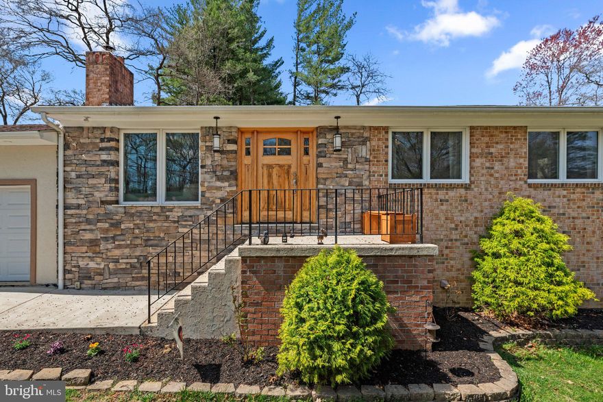 You won't find a home like this very often. This brick home has been beautifully renovated and expanded to fit modern needs. The huge primary suite addition is a custom masterpiece with vaulted ceilings, custom woodwork and spa-like bath. Walnut vanities, barn doors and shelves are hand built and fit to the openings. The main floor open-concept is perfect for entertaining, with a gourmet kitchen featuring stainless steel appliances, granite countertops and top of the line cabinetry. Take the party outside to the large deck overlooking the yard. In addition to the primary suite, there are 3 additional bedrooms upstairs, a second full bath and a half-bath for guests. The lower level has been thoughtfully renovated with bamboo flooring, recessed lights and the game room of your dreams. You will also find a fully decked-out in-law suite with its own kitchen, living room, full bath, bedroom and even its own entrance. This home is not just all about good looks, though. The renovations include: All LED lights, high efficiency 90+ furnace and water heater to lower your energy usage. Not just the custom hand-built wood shelves, but the practical - properly insulated and very good quality windows make this place warm and quiet. Very convenient location. Steps to Bond Mill Elementary school and just 5 min to the great Fairland Sports and Aquatics Complex and parks. Easy access to Route 29 and I-95 and all shopping centers. Get ready to see it soon because it will not last.