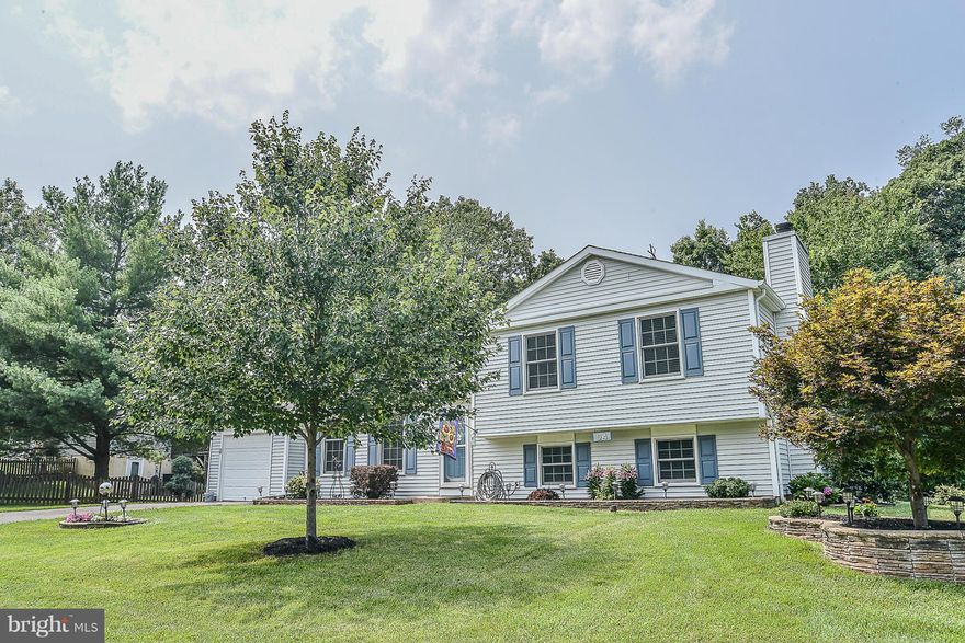 Great Setting on this Gorgeous 4BD 3BTH   Split Level Backing to Woods.  Newly Remodeled Bathrooms- New Paint- New Carpet - Updated Kitchen and a Ton of Sunlight!  Still Time to get Settled in so you can Enjoy Grilling from the Large Deck over looking the Changing Leaves and then Slip into the Cozy Family Room- Near shopping, restaurants, Dulles Town Center and NOVA Community College.  A must see!