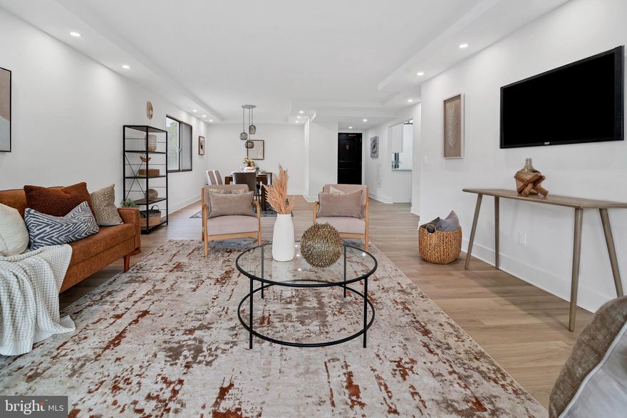 Thoughtfully reimagined and tastefully updated with designer finishes, this 2BR/2BA residence combines modern sophistication with effortless living — with all utilities included in the condo fee.

The chef’s kitchen showcases quartz countertops, stainless steel appliances, an and custom tile backsplash . Wide-plank floors extend through the open dining and living areas, leading to a private 40-foot balcony — ideal for coffee, sunsets, or entertaining.

The primary suite offers a custom walk-in closet and a spa-like bath with a dual vanity. The second bedroom and upgraded hallway bath with a glass shower add versatility, while an in-unit washer and dryer closet enhance daily convenience.

Curated details throughout elevate both form and function. A deeded parking space provides convenience, and residents enjoy resort-style amenities including a pool, fitness center, tennis courts, billiards and party rooms, pet area, and secure app-based entry.

Minutes from I-395, I-495, Van Dorn Metro, Old Town, The Pentagon, and DC — a turnkey statement in refined, modern living.