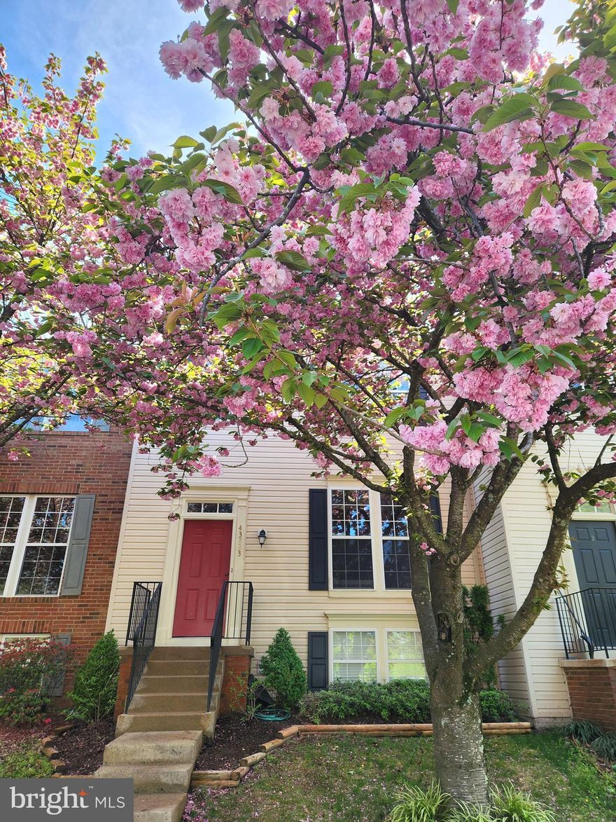 Open House is cancelled! Home is under contract! Beautiful  2200+ finished square feet townhome with bump outs on main & lower level! Sunny family room off kitchen with vaulted ceiling & skylights that walks out to a huge  19' deck! Large eat in country kitchen with a center island,  granite counter tops & stainless steel appliances.  Primary  bedroom has a vaulted ceiling, primary bath with double vanities & a walk in closet! Walk out lower level with a huge rec room with ceramic tile flooring, a gas burning fireplace, a den or possible 4th bedroom plus lots of storage! Freshly painted throughout! New roof in March 2024.  New wall to wall carpet! HVAC new in 2021. Shows great! Enjoy all of Ashburn Farm amenities! Only 4.5 miles to the new Ashburn Metro