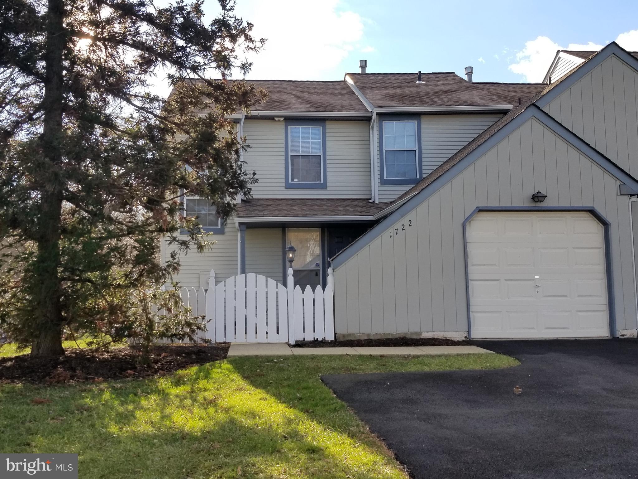 This beautiful 3 bedroom, two full and one half bathroom townhome has been meticulously renovated and is ready for you to move right in. The entire home has been freshly painted throughout and is accented by gorgeous engineered hardwood floors on the first floor and brand new carpeting both upstairs and in the finished walk out basement. Upon entering, you are greeted by cozy foyer that opens to bright, spacious living room complete with large windows, a sliding door to the deck and corner stone floor to ceiling fireplace. To the right is a flawlessly updated eat-in kitchen that boasts granite countertops, recessed lighting, glass tile backsplash, antique white cabinetry and stainless steel appliances. There is also a pass through to the living room with a breakfast bar as well as a large dining room with chair rail and sliding door to the deck. The second floor is home to new hall bath with upgraded fixtures, tile and vanity, a laundry area and three bedrooms, including an owner's bedroom with cathedral ceiling, his and hers closets and a private bath with a glass stall shower and marble tile surround, new vanity with granite countertop and upgraded lighting and plumbing fixtures. There is also a spacious finished walk out basement with sliding door to the back patio which would make an ideal space for a family room or recreation space. There is also a community pool and tennis courts for use by residence in the development. With so much to offer, this rental will not last long so don't wait. Schedule your showing today! Landlord is PA licensed real estate agent.