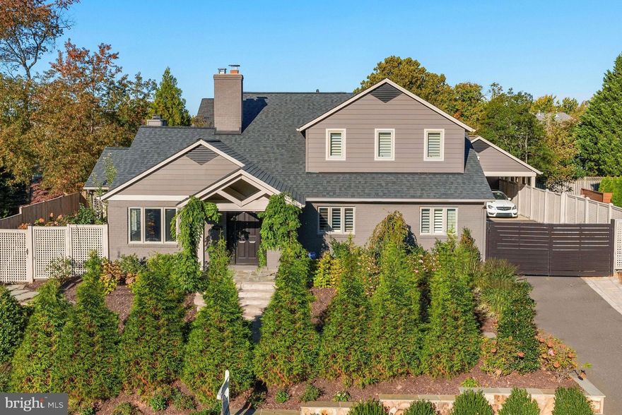 Fabulous renovation throughout this special Arlington home.  NEW HVAC (2 zones), MUST SEE UBER LUXE KITCHEN OPEN TO FAMILY ROOM WITH 11-FT VAULTED CEILING, SIX SETS OF DOORS OPENING TO PRIVATE FENCED REAR GARDEN - PERFECT FOR INDOOR-OUTDOOR ENTERTAINING. NEW PAINT IN & OUT. RECESSED LIGHTING, MUD ROOM/BUTLER'S PANTRY W/ WET BAR & ICE MACHINE. GREAT NATURAL LIGHT. 4 Bedrooms include a private upper level Master Suite, plus 3 main level bedrooms! Luxurious finishes, ultimate chef's Kitchen includes high-end Dacor appliances including 6-burner gas range with oven, PLUS double wall oven (3 total ovens!), French door refrigerator integrated within the cabinetry, integrated Bosch dishwasher, and sleek custom cabinetry. New Electrolux washer & dryer upstairs w/ laundry sink. Other highlights: Vaulted ceilings, 2 fireplaces w/ remote controls, lush landscaping, window treatments, lawn sprinkler system, back-up generator, 2-car carport with gated entry, private fenced backyard & garden perfect for entertaining, on a private 0.23-acre lot overlooking the neighborhood in great location less than a mile to Washington Golf & Country Club, and moments to Chain Bridge and DC! Jamestown Elementary, Williamsburg Middle, and Yorktown High Schools!