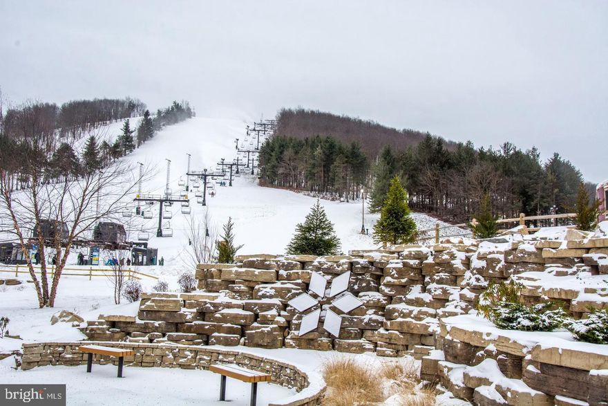 Check out this rarely available, in demand lower-level Wisp Resort Unit 118a.  Here is a chance to own a Unit at Maryland's premier 4 seasons resorts. Ownership in this unit includes 2 individual season ski passes. 2 golf memberships for Fantasy Valley Golf Course. Unrestricted access to indoor pool and fitness room. 10 snowtubing tickets per season. Owners also enjoy special hotel rates for themselves and guest of theirs. Additionally, if you place your unit in the rental pool, you can receive dividend checks yearly based on the resort's profitability.  Don't miss this rare opportunity to join the Wisp Resort community and access to ownership's many benefits.