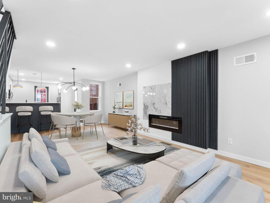 Introducing the talk of the town at 5846 Lebanon Avenue. This isn't just a house; it’s a complete transformation designed for the modern buyer who wants style, luxury, and zero projects. Tucked away on a quiet street yet moments from the vibrant energy of City Ave, this home offers the ultimate "best of both worlds" lifestyle. The main level makes a bold first impression with a wide-open floor plan, accented by newly installed hardwood floors and sophisticated recessed lighting. The true centerpiece of the home is the custom-designed panel wall featuring a sleek electric fireplace—the perfect backdrop for hosting or relaxing. The designer kitchen outfitted with crisp shaker-style cabinetry, elegant quartz countertops, and a classic subway tile backsplash. A sizeable breakfast bar provides additional seating and serves as the social hub of the home. Upstairs, the luxury continues in the owner’s suite. This private sanctuary boasts a custom tray ceiling with integrated lighting design and its own modern, spa-inspired bath. Two additional bedrooms provide ample space, while the fully finished basement offers a versatile area perfect for a home office or family room. Step outside to your newly built deck, perfect for summer grilling and outdoor entertaining. Enjoy walking distance to Saint Joseph’s University and immediate proximity to the shops and dining of City Ave. Whether you take the nearby Expressway or the scenic routes of Montgomery and Kelly Drive, you are only 25 minutes from Center City Philadelphia. With every major system updated for complete peace of mind, this home is a true gem. Schedule your private tour today—you will not be disappointed! *** PLEASE NOTE- THIS PROPERTY IS NOT FOR RENT***