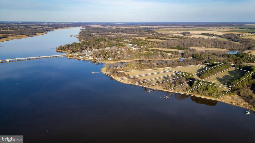 Extraordinary opportunity to purchase the estate of Clorea Truslow—the cherished namesake of Truslow Rd. For generations, this land has been held dear by the Truslow family, and now, for the first time, it is being offered for sale, presenting a once-in-a-lifetime chance to make it your own.

Nestled just across the river from the vibrant events of the Sulatana, Downrigging, Tea Party festivals, and more, you'll enjoy front-row seats to the action from the comfort of your own home. Embrace the charm of yesteryears while immersing yourself in the excitement of contemporary festivities.

This timeless home beckons with a flowing floor plan, tall ceilings, and gleaming hardwood floors, offering a canvas for your imagination to flourish. With spacious rooms, ample storage, and an elevator, convenience meets elegance at every turn. Breathtaking views serve as a backdrop to daily life, with 3 out of 4 bedrooms offering sprawling views of the river's beauty.

While the home may require some tender loving care, its inherent value shines through, promising a rewarding renovation journey. Imagine waking up to the gentle lapping waves and retiring to the rooftop deck or screened in porch, a tranquil oasis awaiting restoration. The dock, though in need of replacement, boasts ample water depth, inviting you to dock your boat and enjoy at your leisure.

Don't miss the chance to make this piece of history your own. Schedule a showing today and experience the allure of this timeless home firsthand. It's an opportunity not to be missed. Sold "as is."