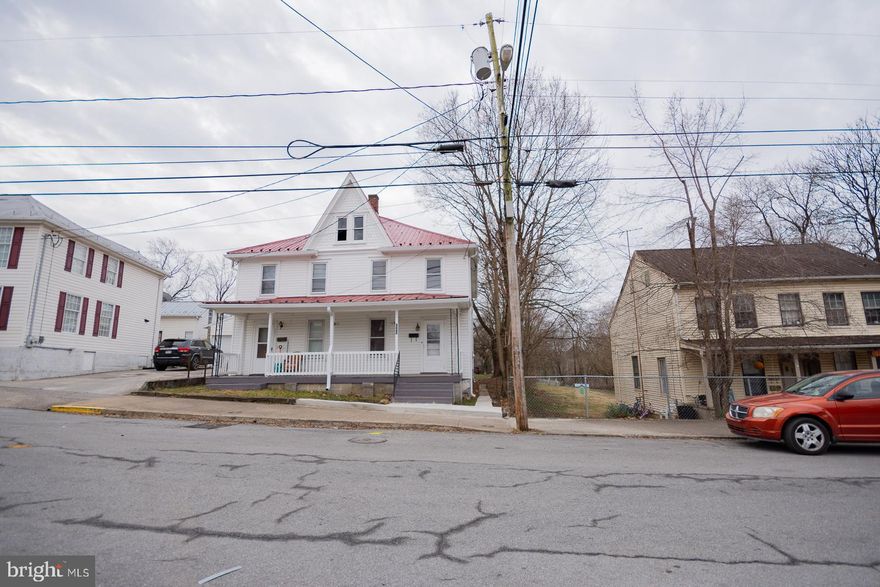 Presenting a recently renovated 3-bedroom, 2.5-bathroom half duplex, ideally situated mere minutes from the Marc Train. The kitchen showcases brand-new appliances, butcher block countertops, an island, and includes all necessary kitchen amenities. Enjoy the convenience of a laundry area conveniently located on the second level, complete with a washer and dryer. Luxuriate in the spacious bathrooms featuring new LVP flooring and showers. Delight in the expansive front porch and relish the proximity to restaurants and shopping within walking distance. This residence is an absolute must-see, offering both comfort and convenience in abundance.